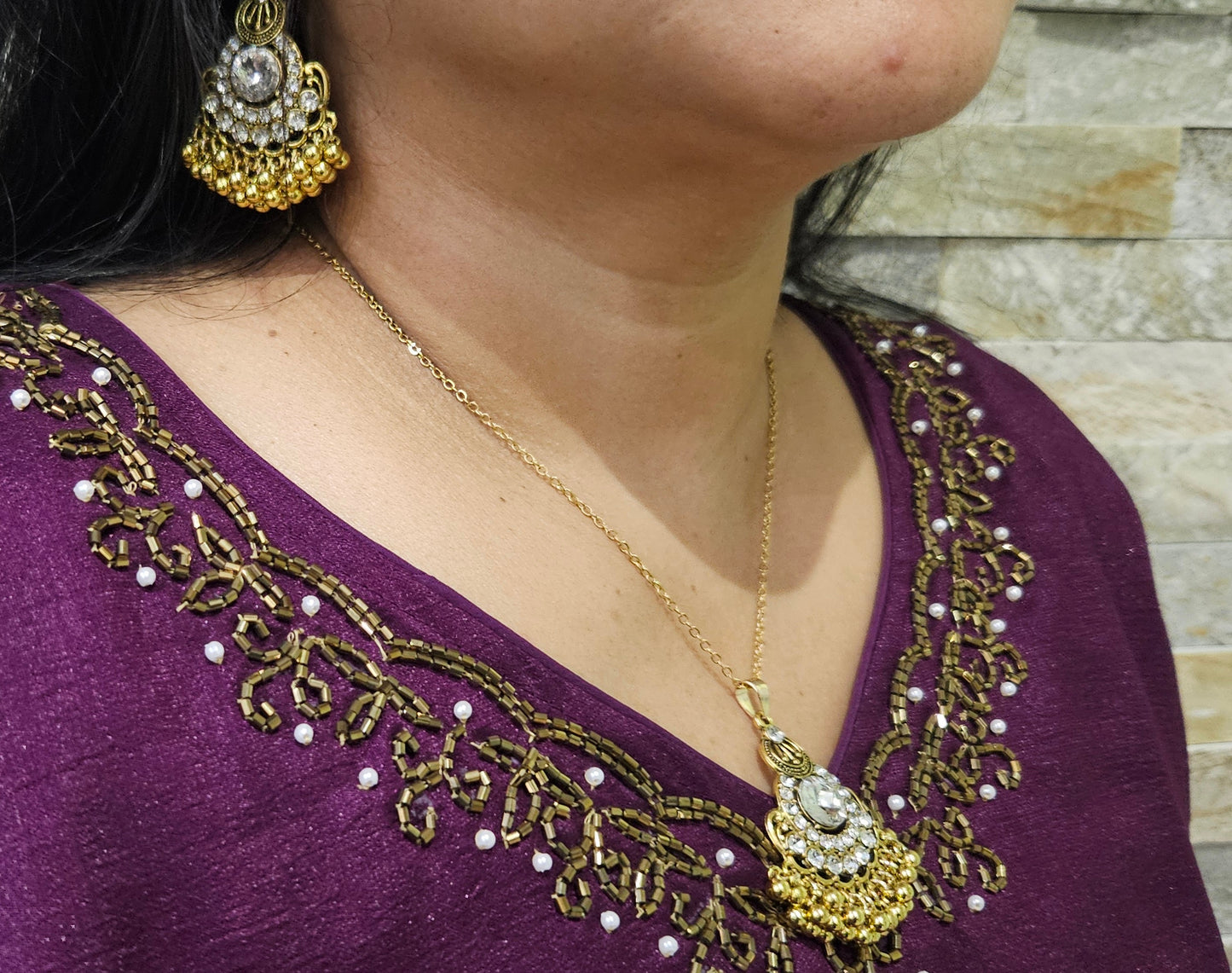 A line kurti with neck and sleeve bead work -Dark purple