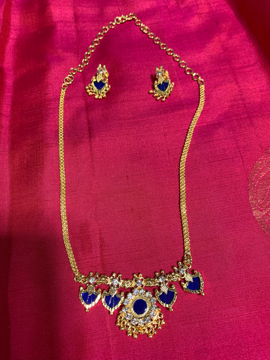 Golden chain with beautiful blue stone