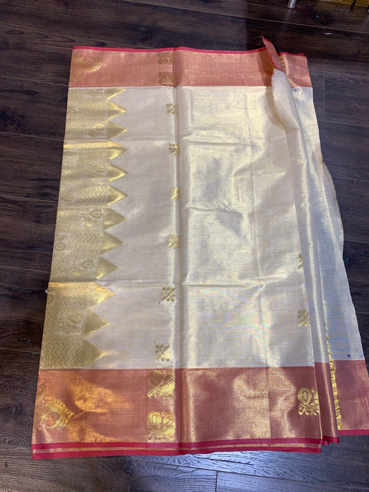 Golden tissue saree with light red border