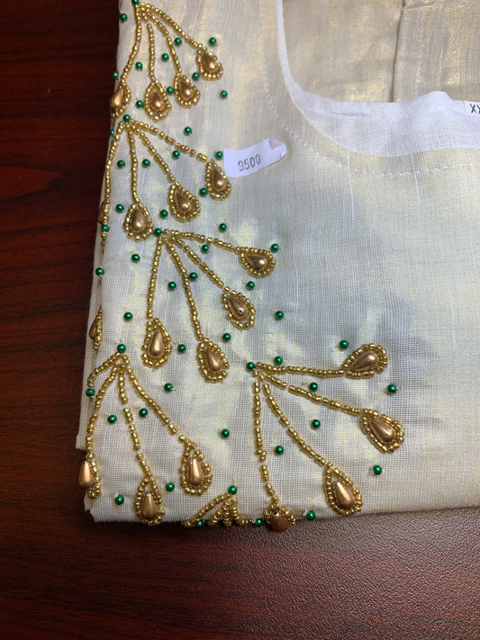 Golden tissue kurti with beads work