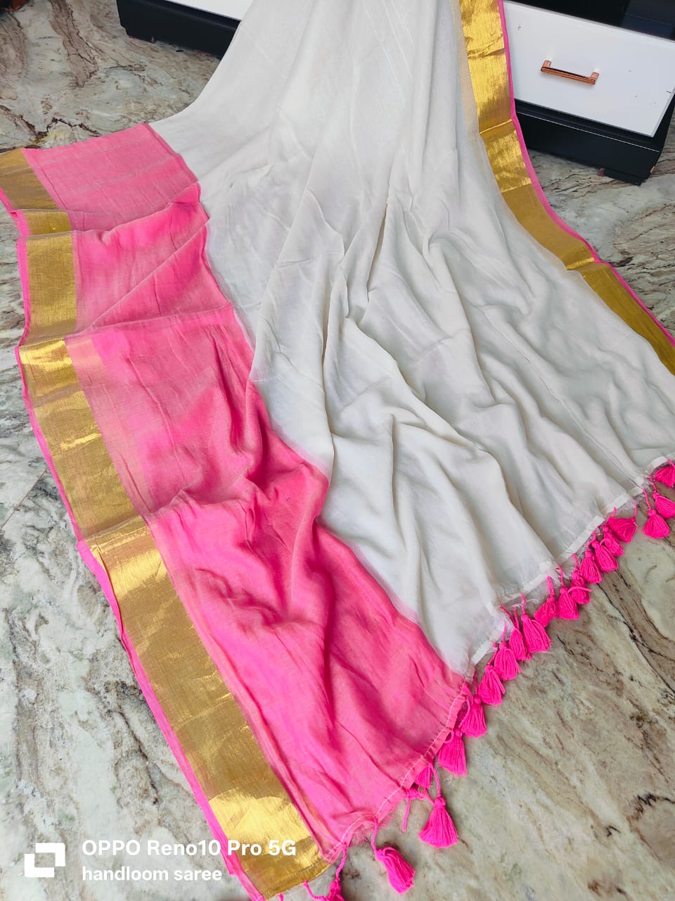 Off white mul cotton saree with pink and golden border