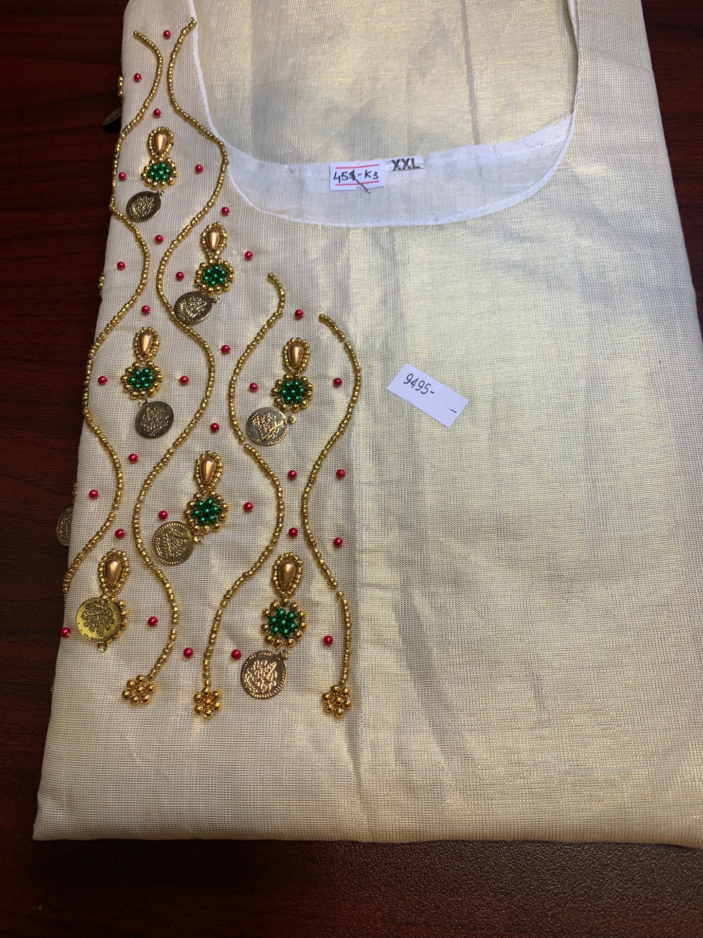 Golden tissue kurti with beads work