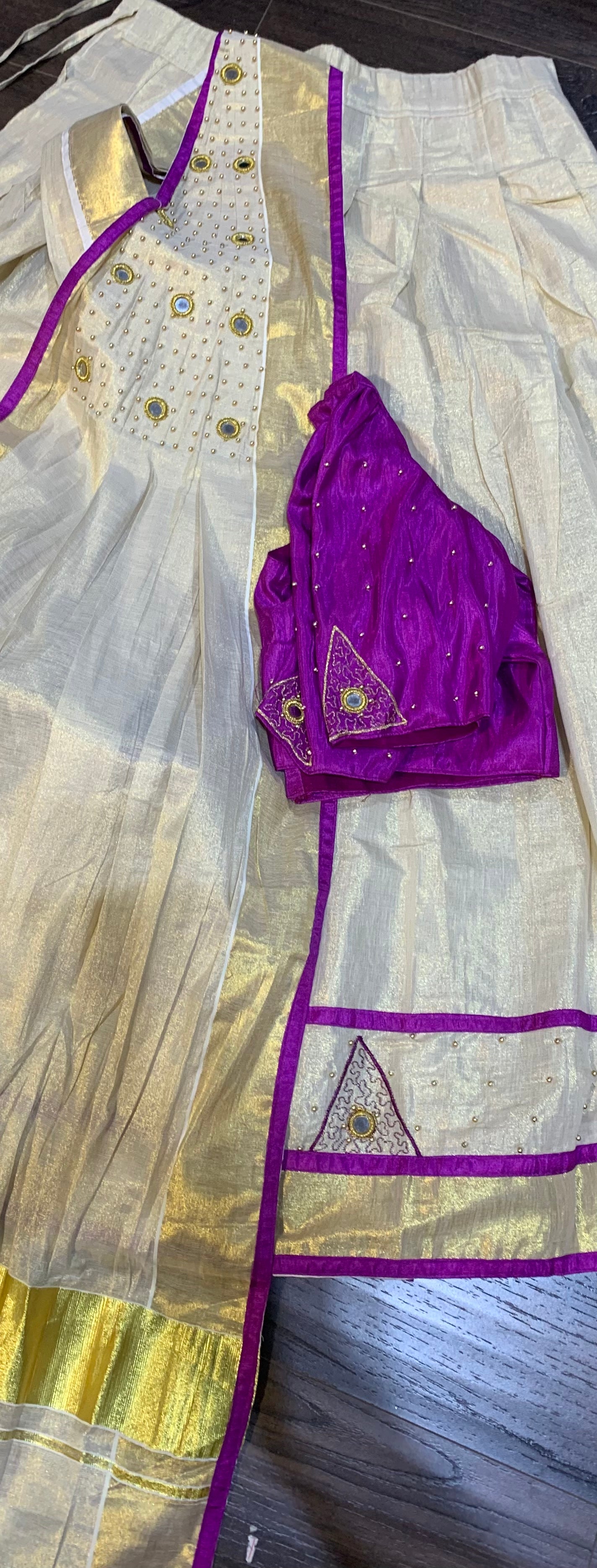 Kerala golden tissue and purple davani set