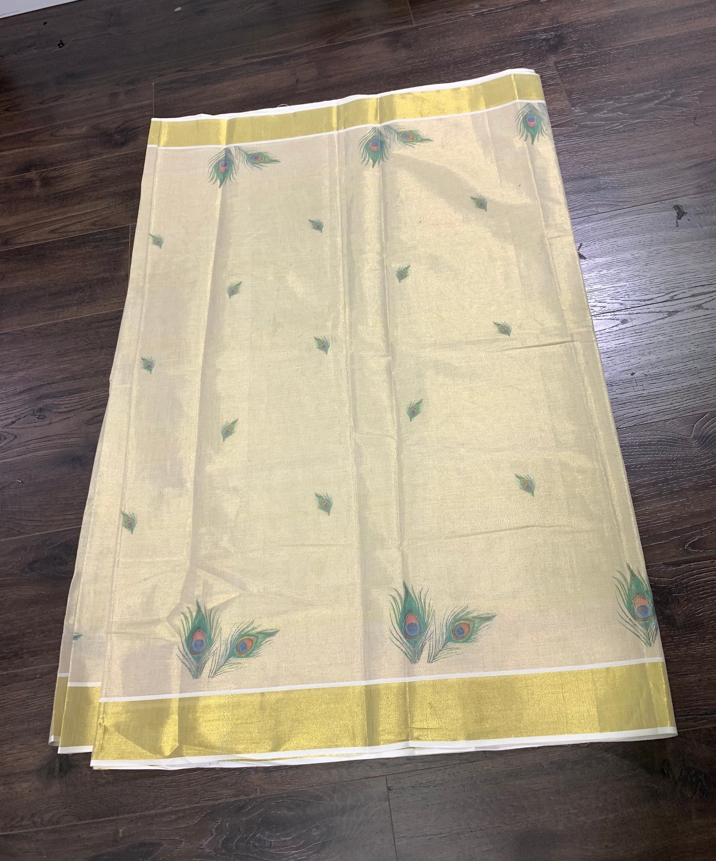 Kerala golden tissue 𝙃𝙖𝙣𝙙𝙡𝙤𝙤𝙢 saree with peacock hand painted pallu saree