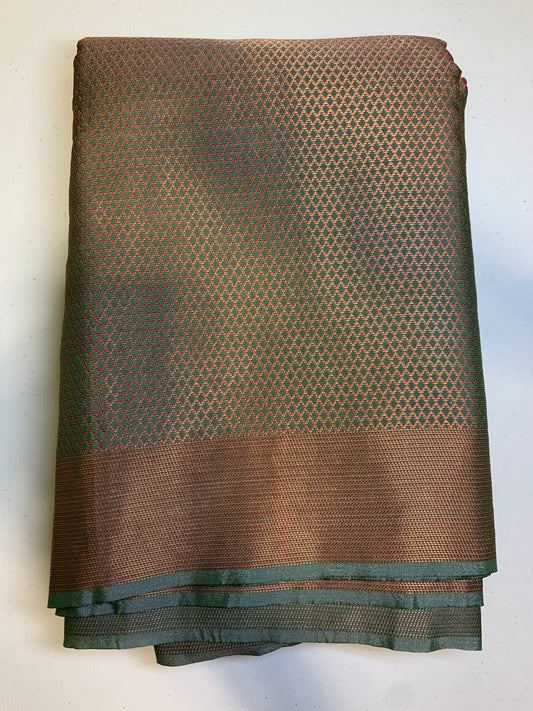 Olive green copper zari border art silk saree(unstitched blouse)