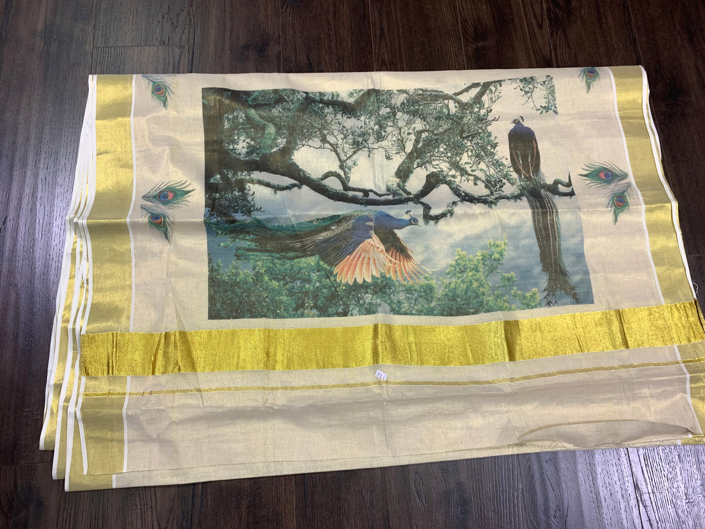 Kerala golden tissue 𝙃𝙖𝙣𝙙𝙡𝙤𝙤𝙢 saree with peacock hand painted pallu saree