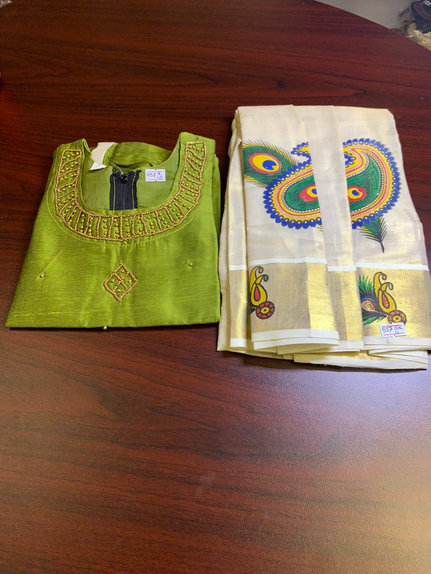 Girls Kerala kasavu border skirt with light green top