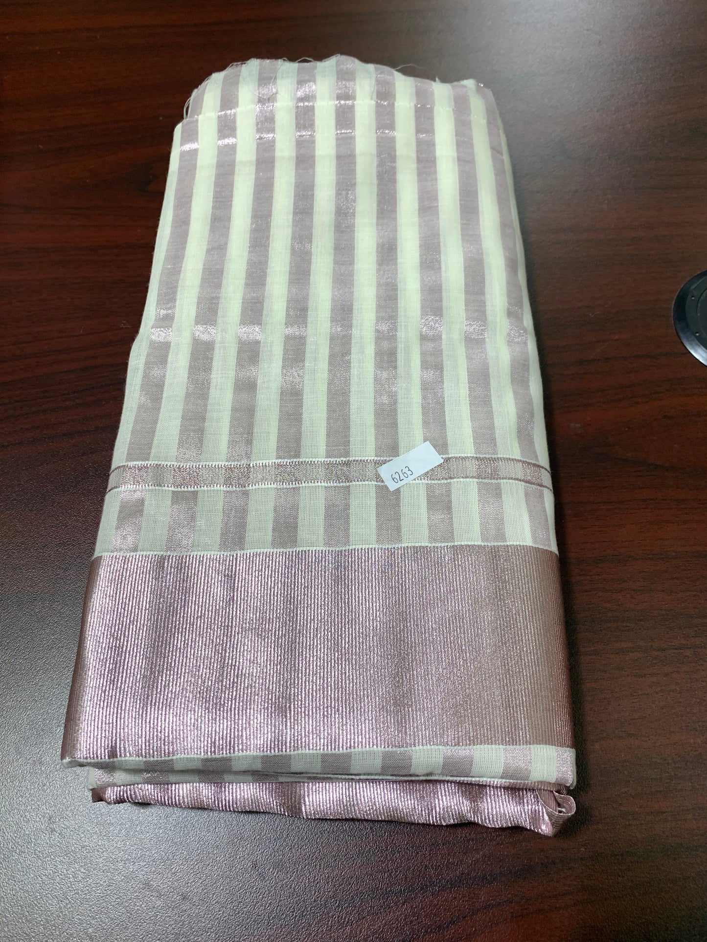 Kerala rose gold tissue saree with pink border