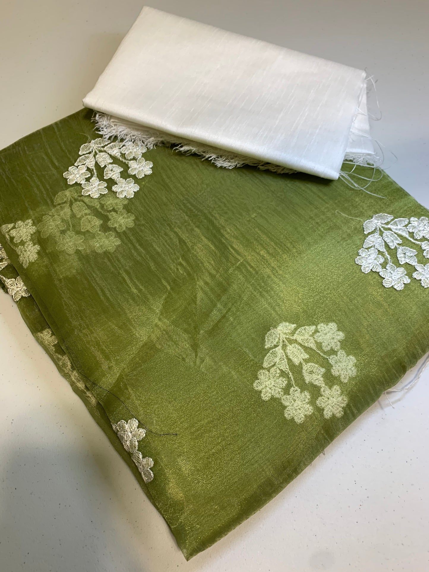 Light green organza white thread woven designs (unstitched blouse)