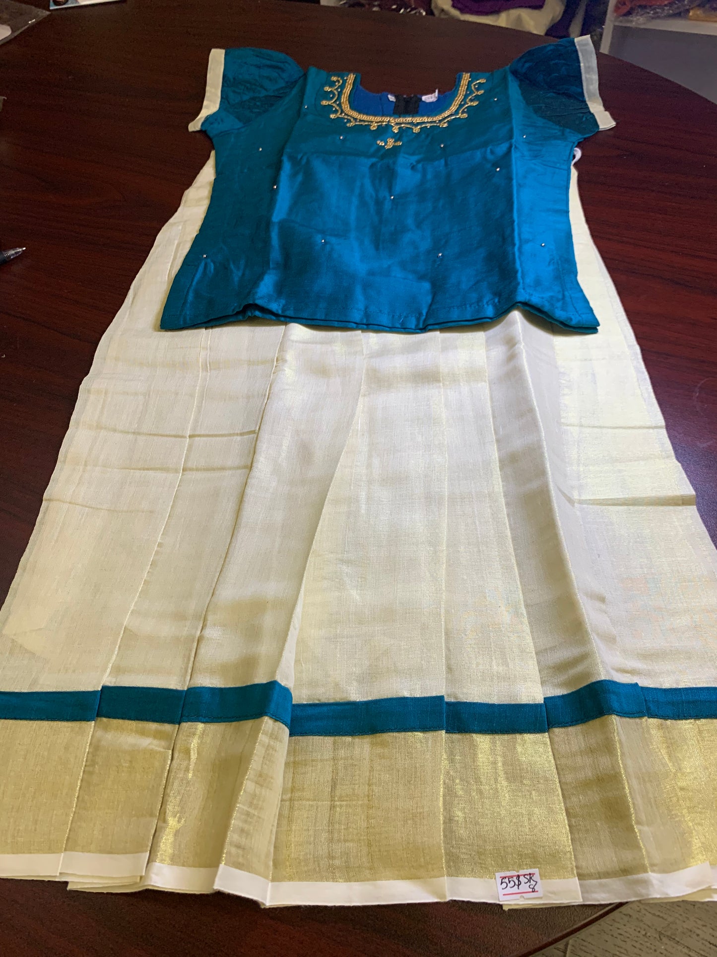 Kerala kasavu border skirt with blue silk blouse