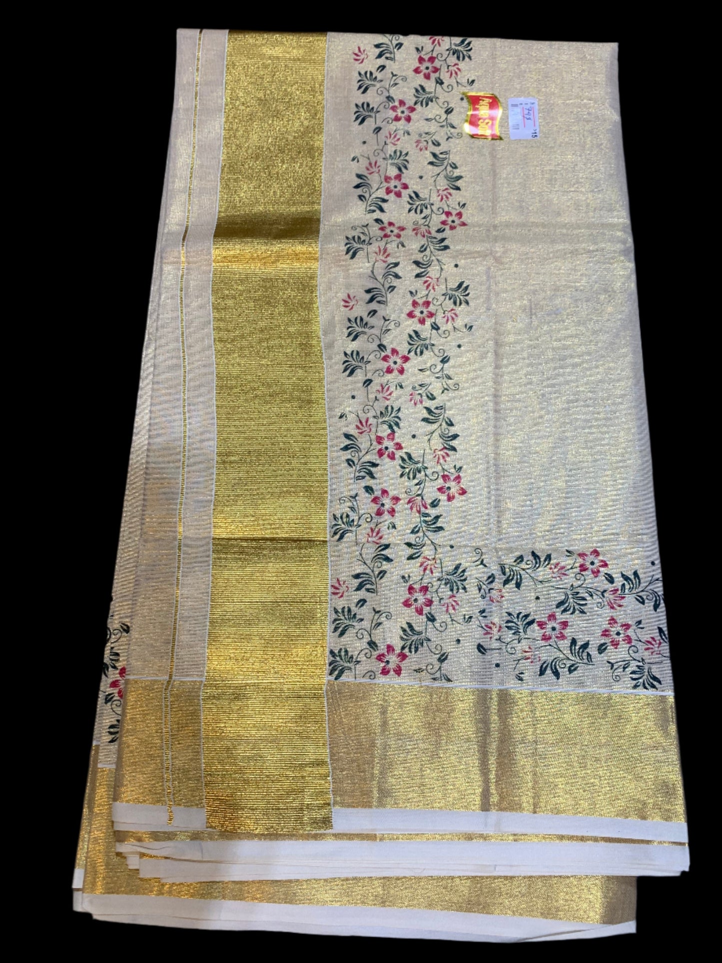 Kerala golden tissue saree with floral print