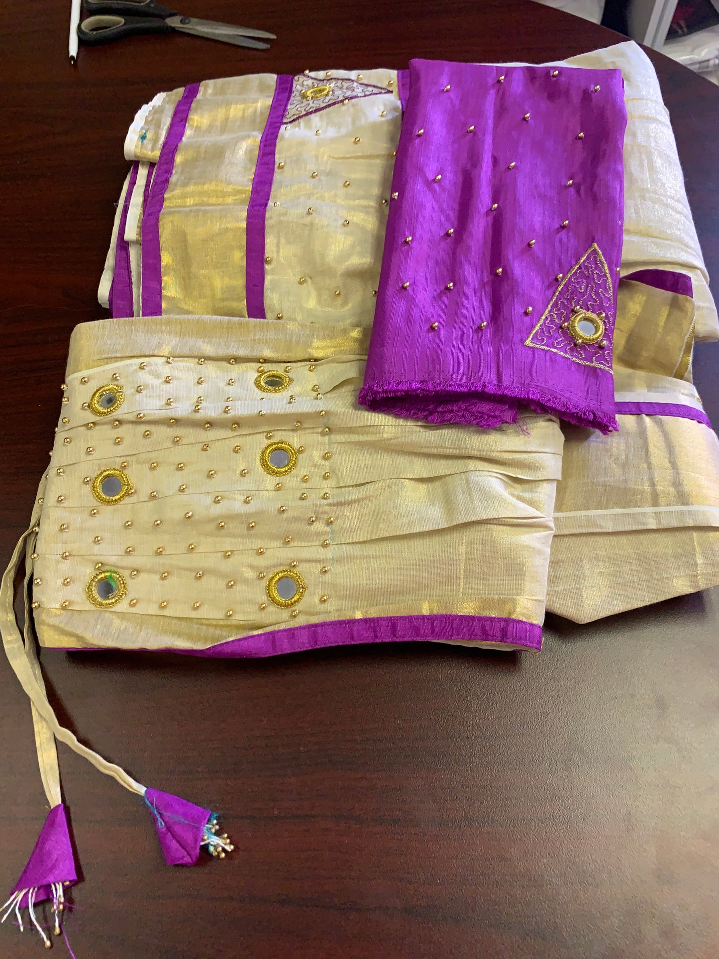 Kerala golden tissue and purple davani set