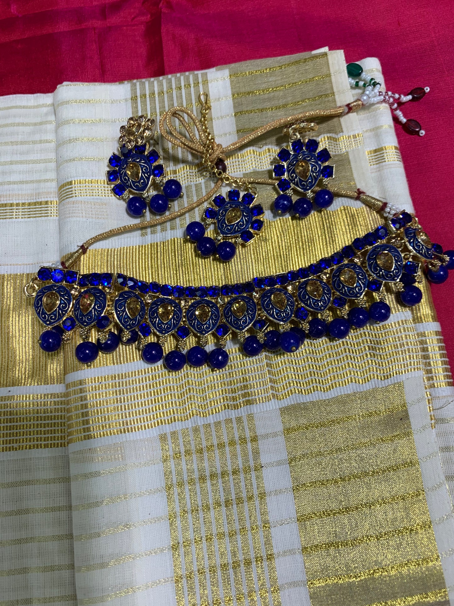 Blue and gold stone studded necklace set