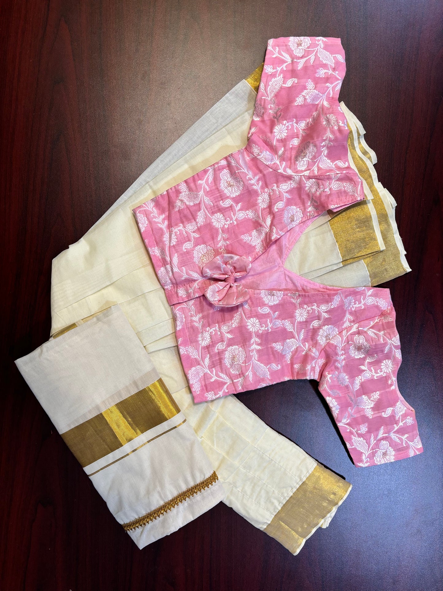 Davani set in Kerala kasavu material with pink cotton top