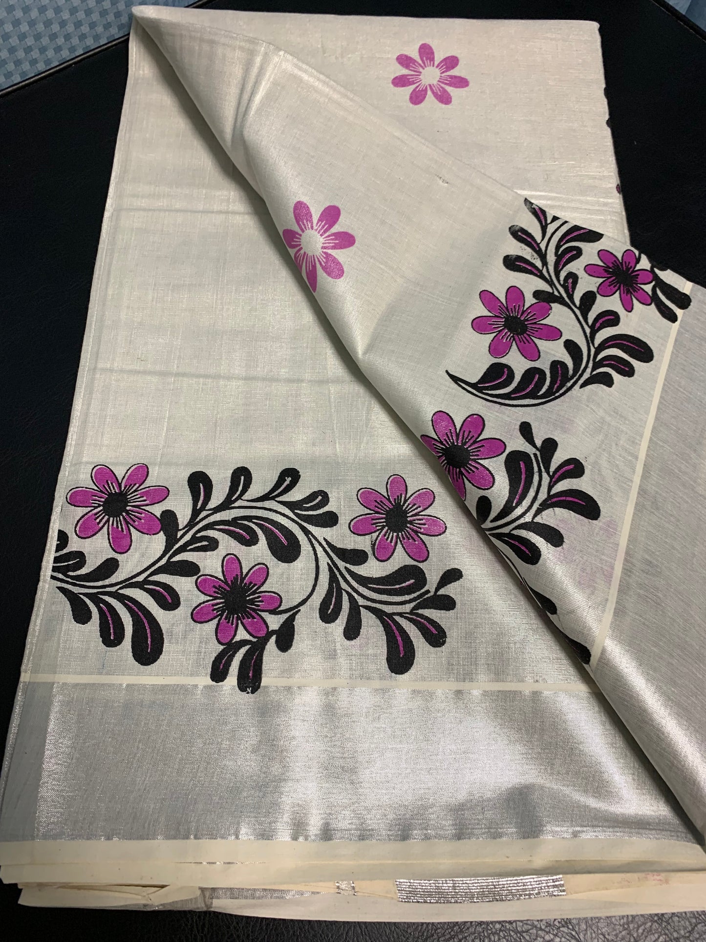 Kerala silver tissue saree with silver border and pink floral print