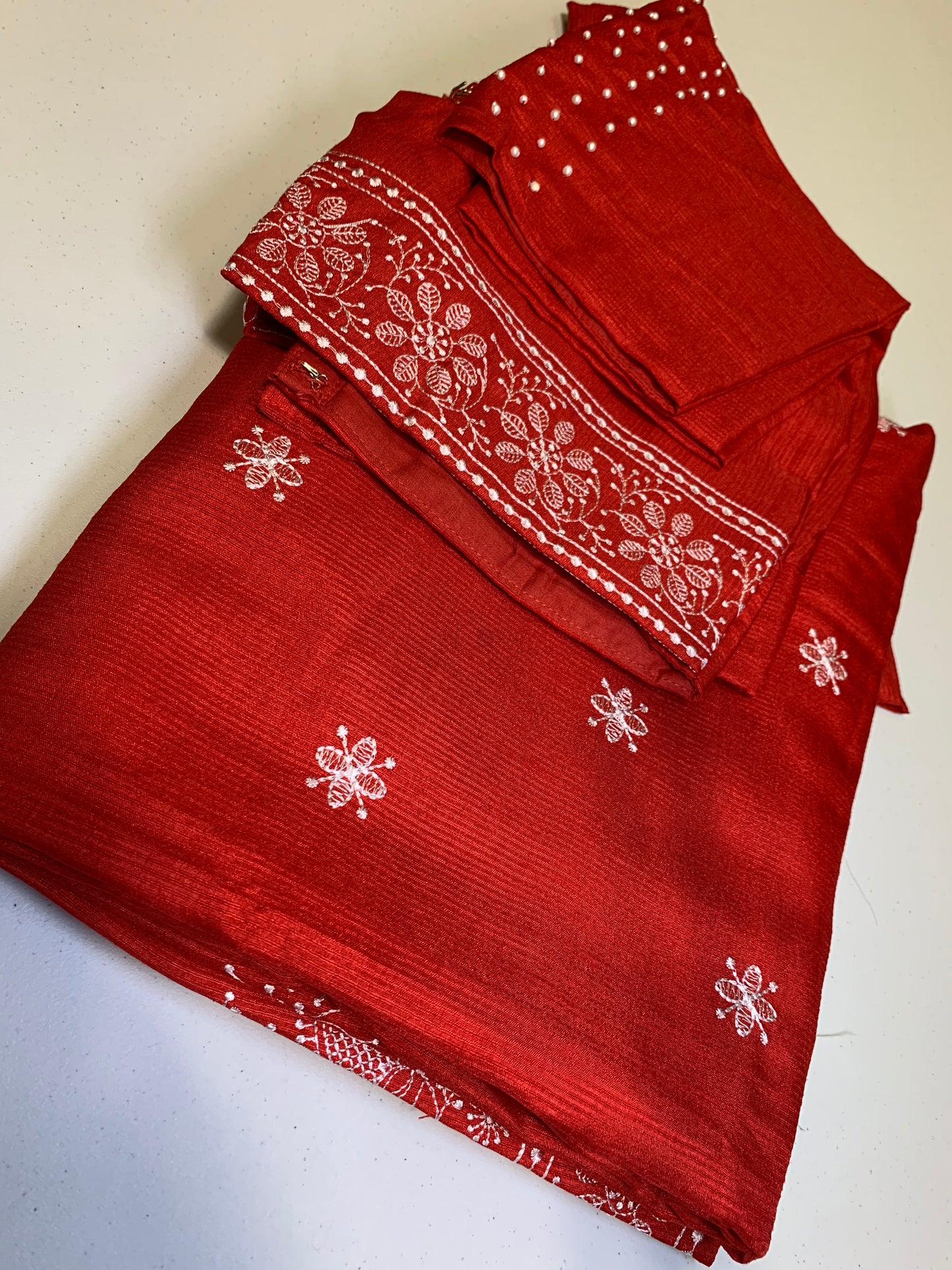 Red Kota silk saree white chikankari design-stitched blouse with white pearls