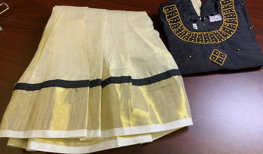 Girls Kerala kasavu skirt with golden border and black blouse