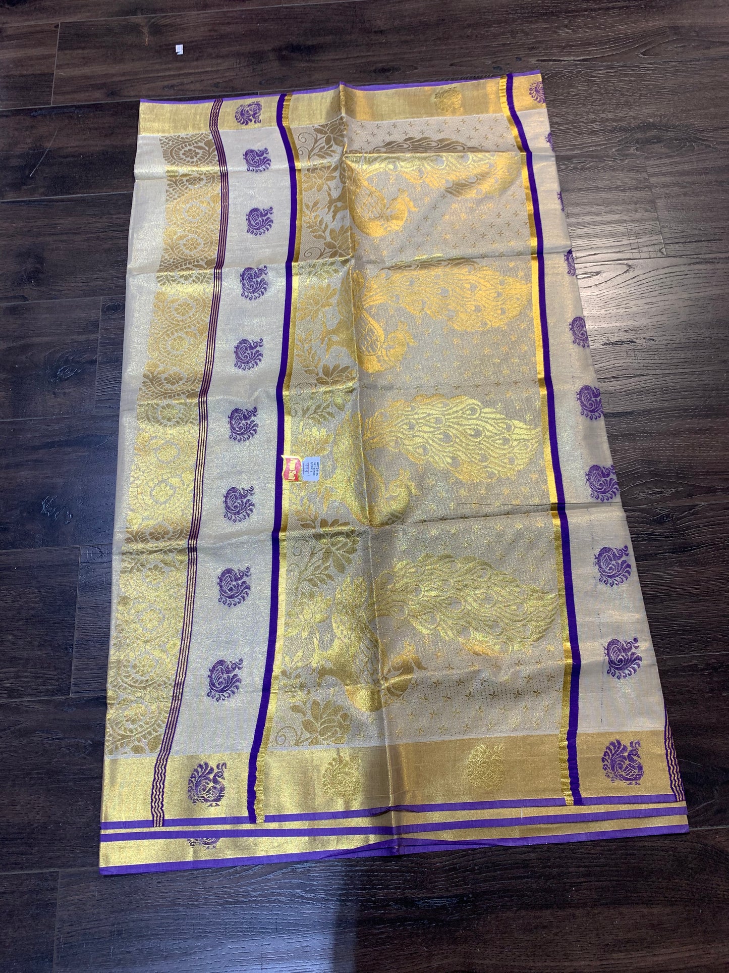 Golden tissue saree with purple border