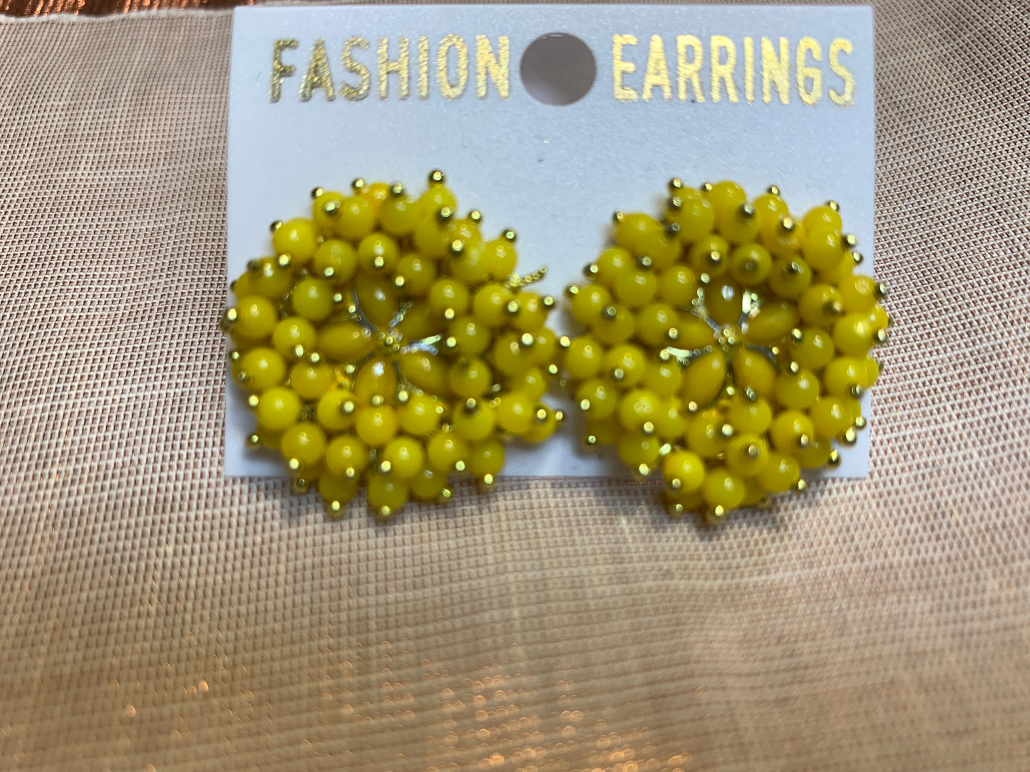 Yellow pearls studded earrings