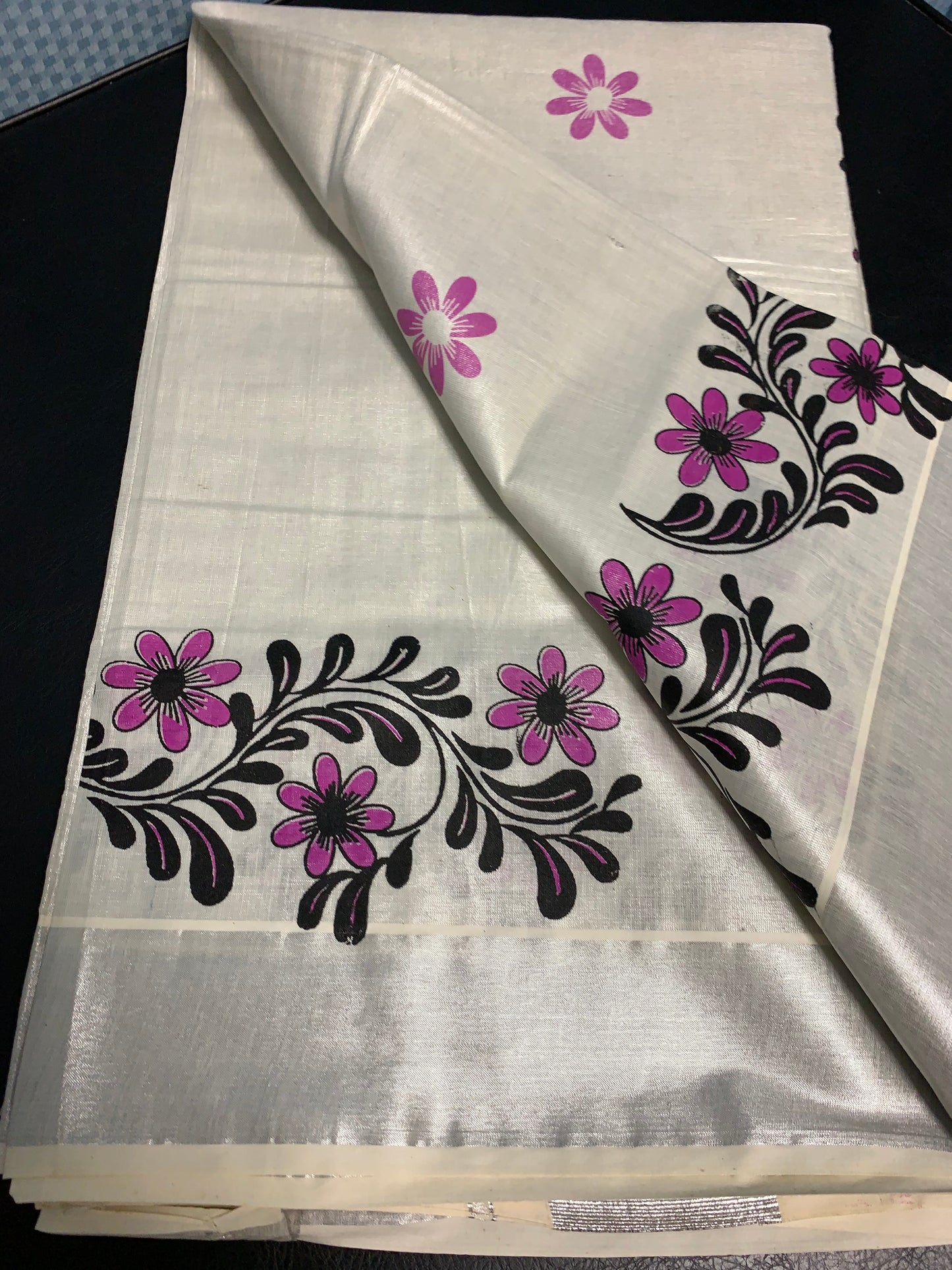 Kerala silver tissue saree with silver border and pink floral print