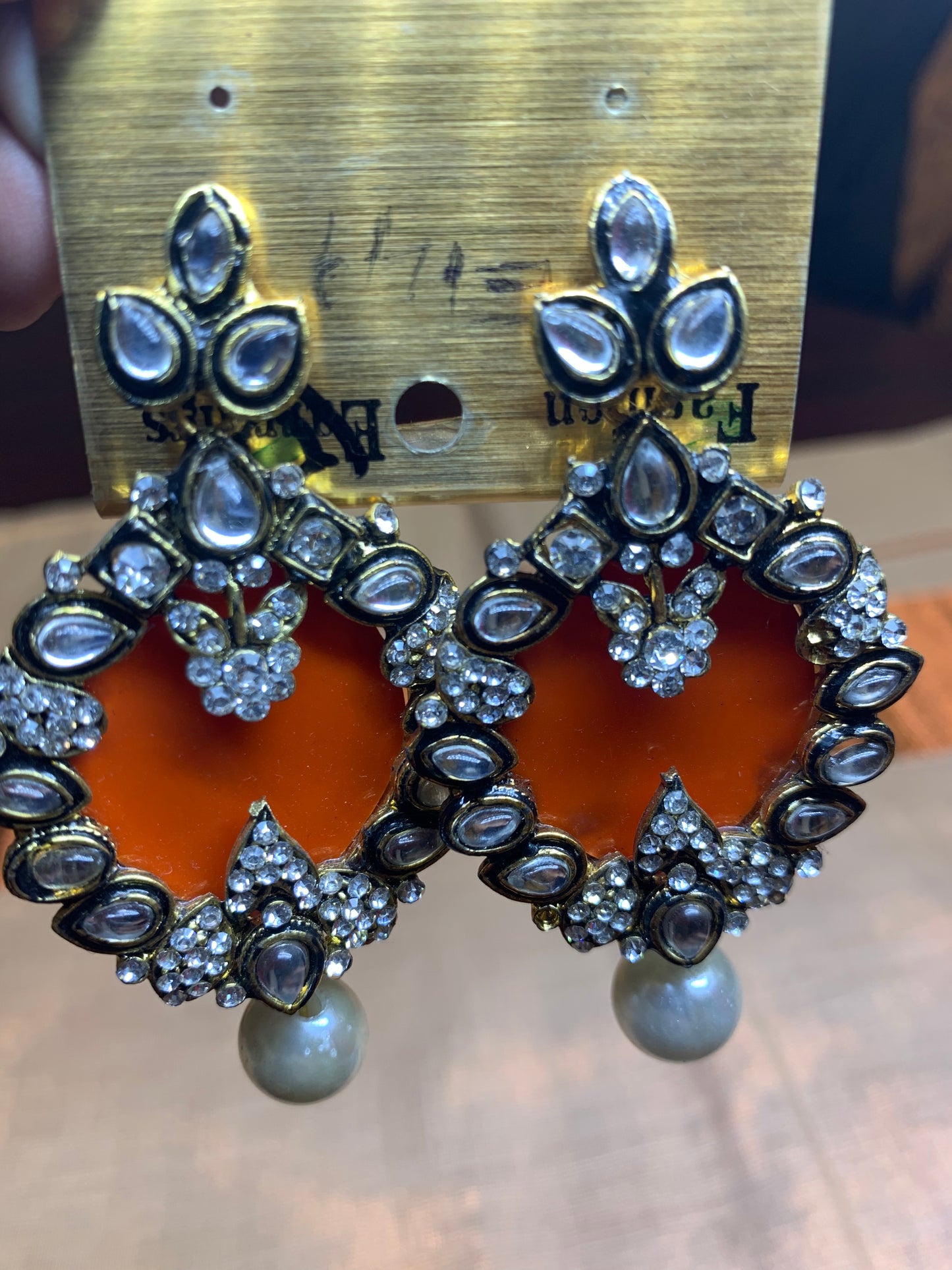 Orange crystal studded pearl earring