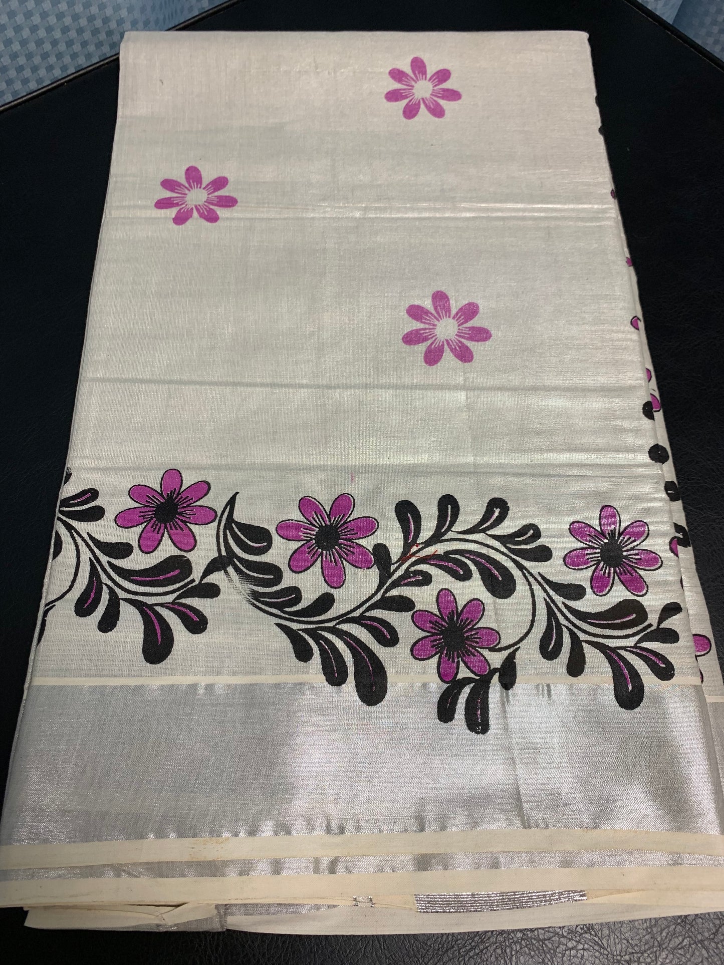 Kerala silver tissue saree with silver border and pink floral print