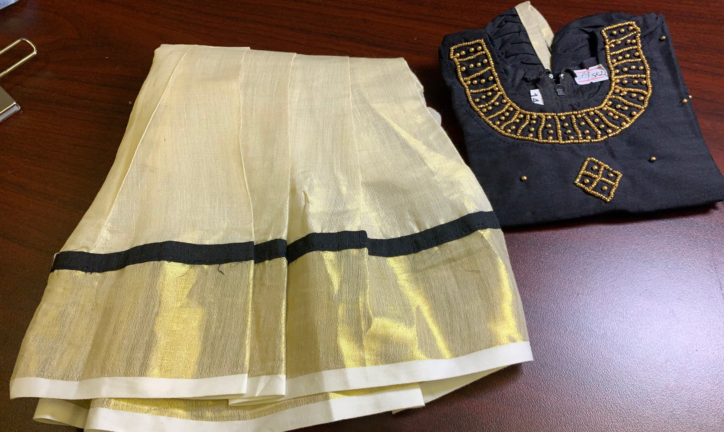 Girls Kerala kasavu skirt with golden border and black blouse