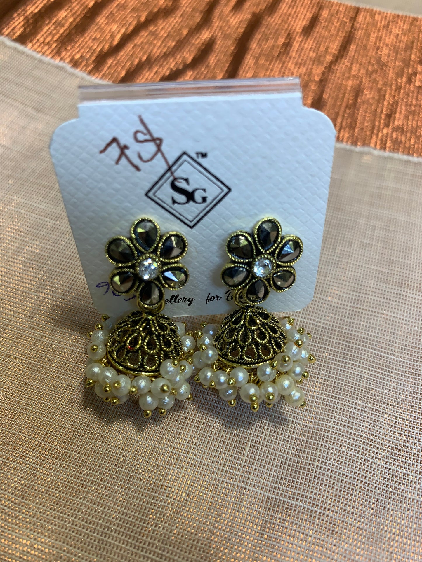 White pearl black golden jhumka earring