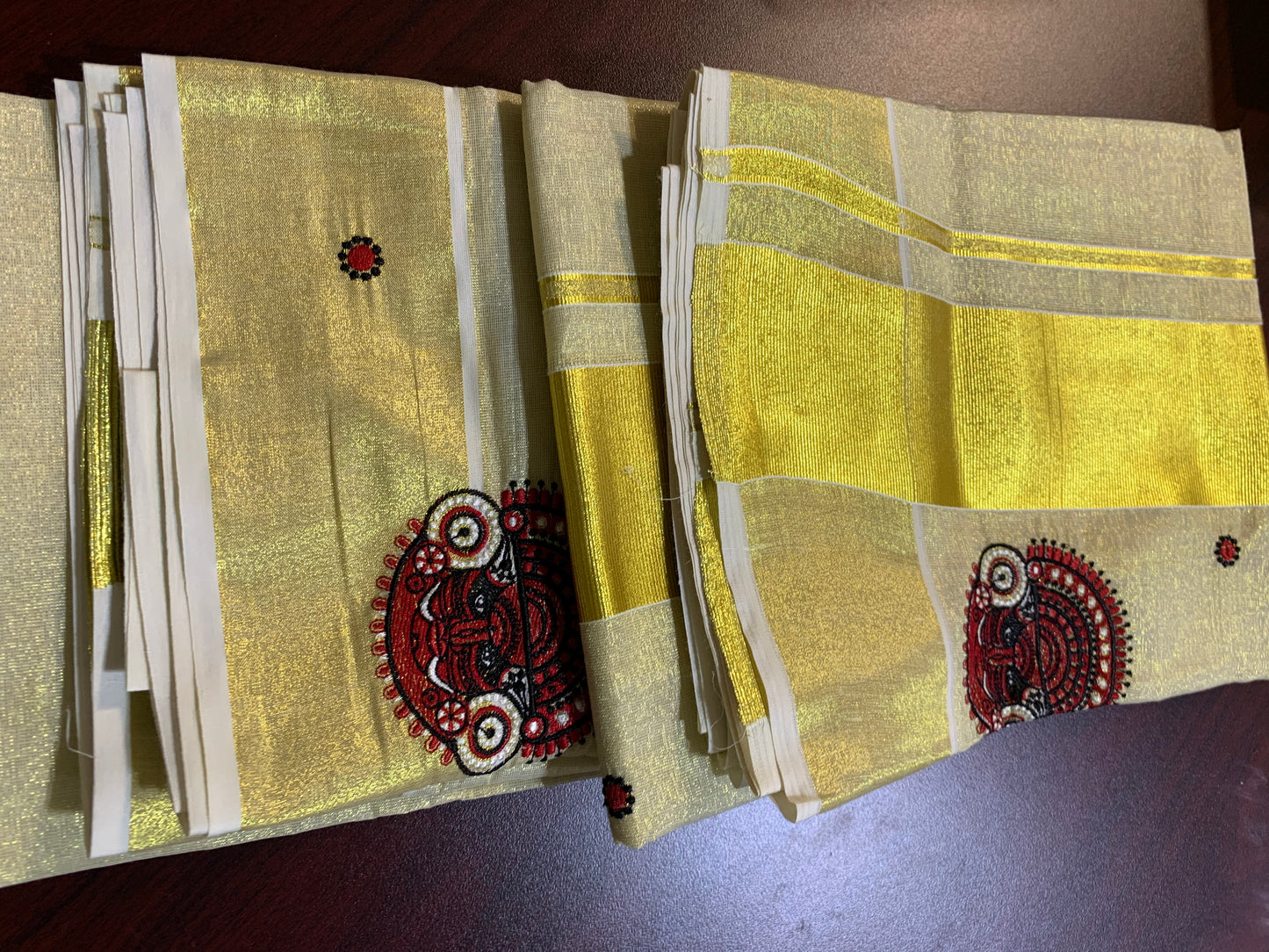 Kerala tissue kasavu settu Mundu with face embroidery