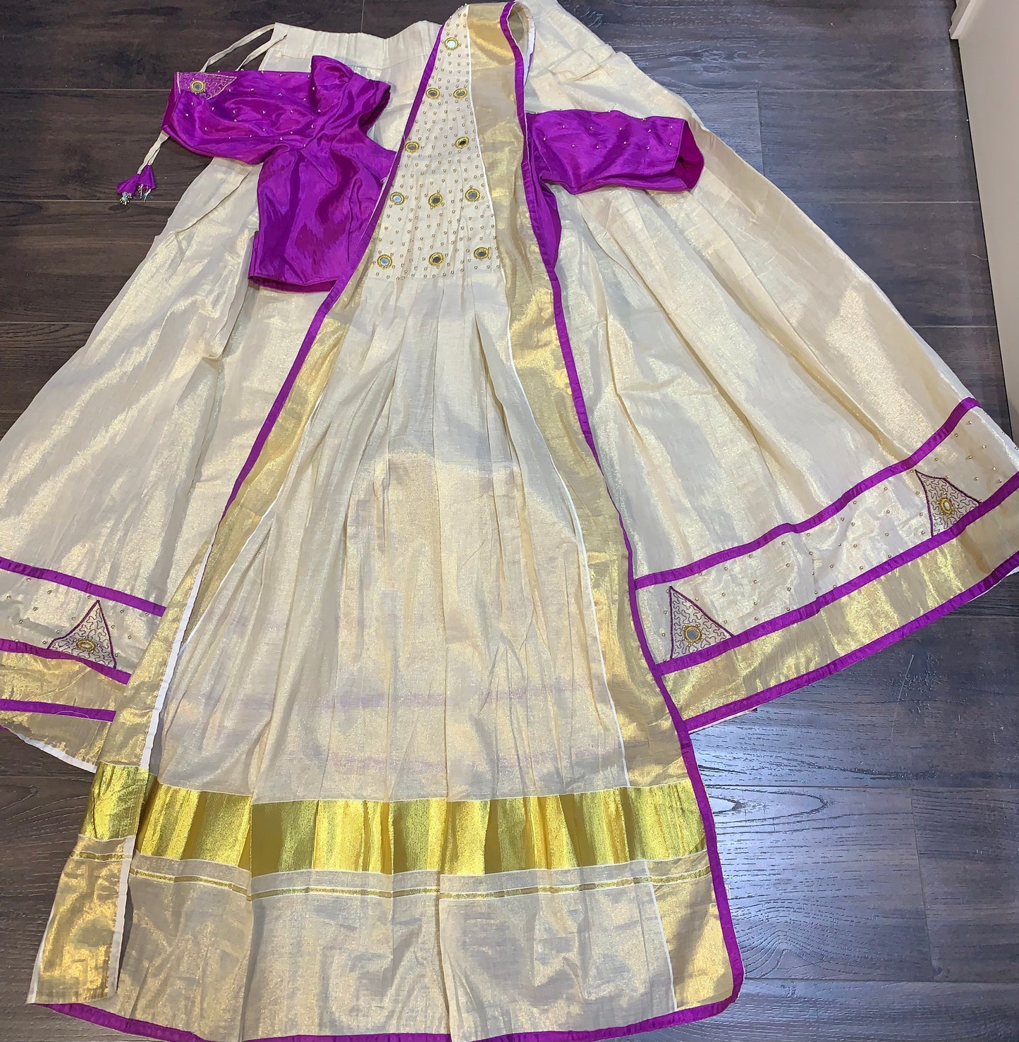 Kerala golden tissue and purple davani set