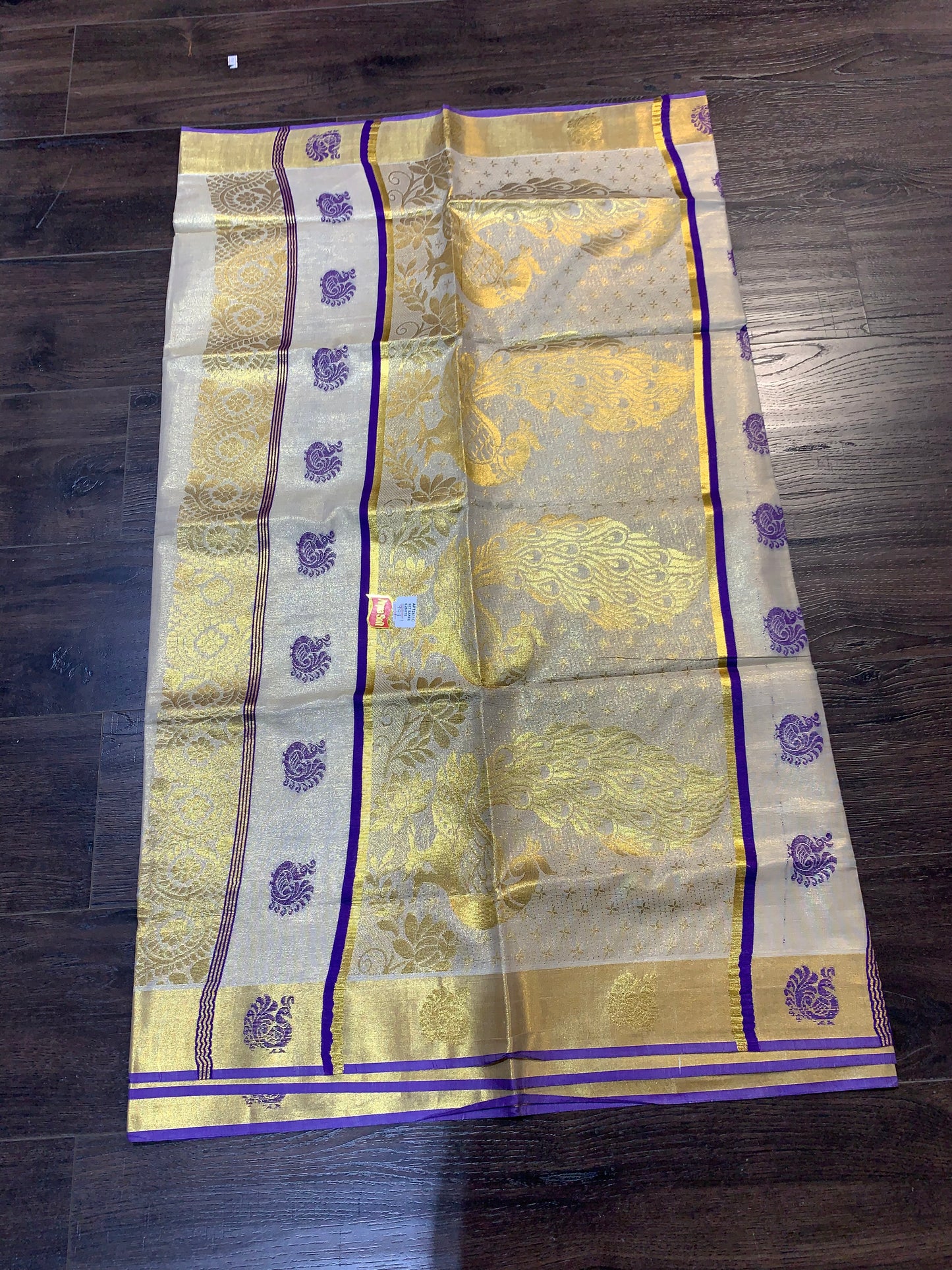 Golden tissue saree with purple border