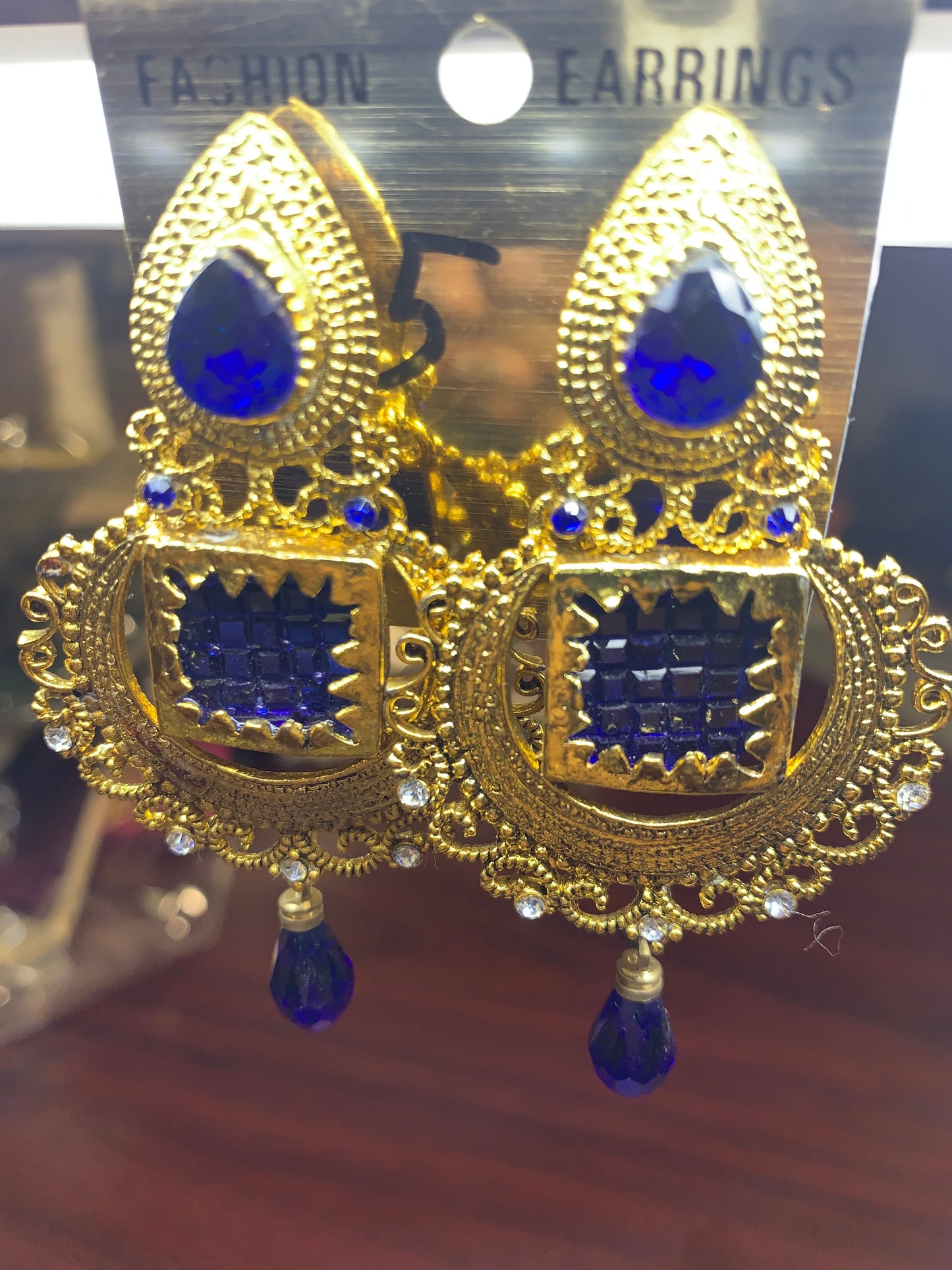 Gold sparkling blue Crystal earring