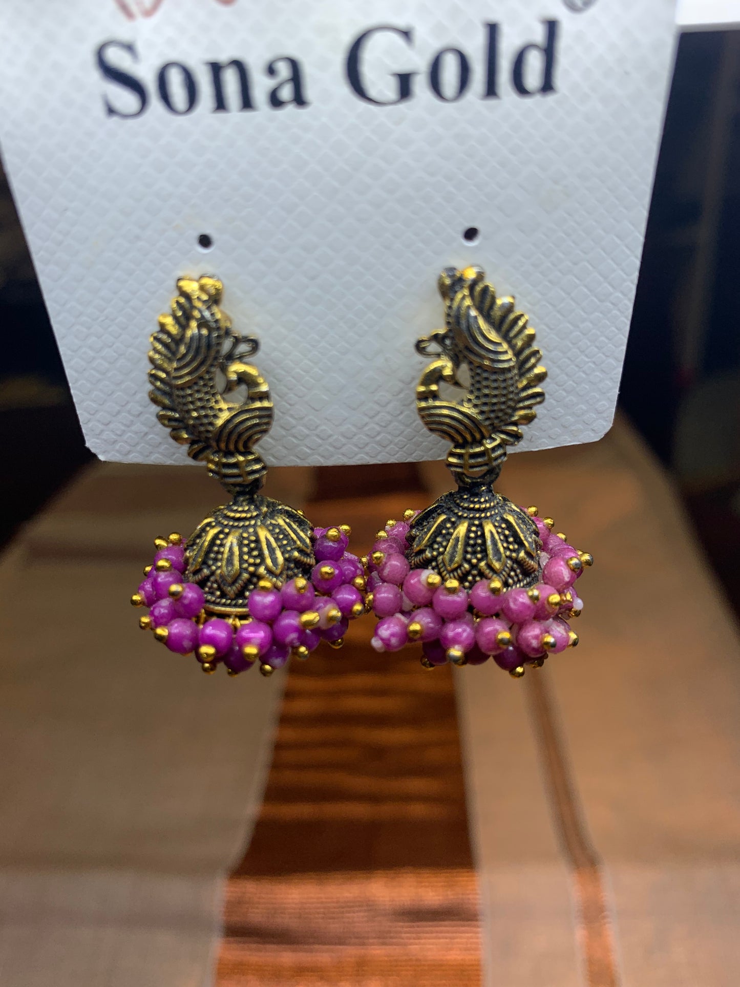 Purple peacock designed beads filled small jhumka earring