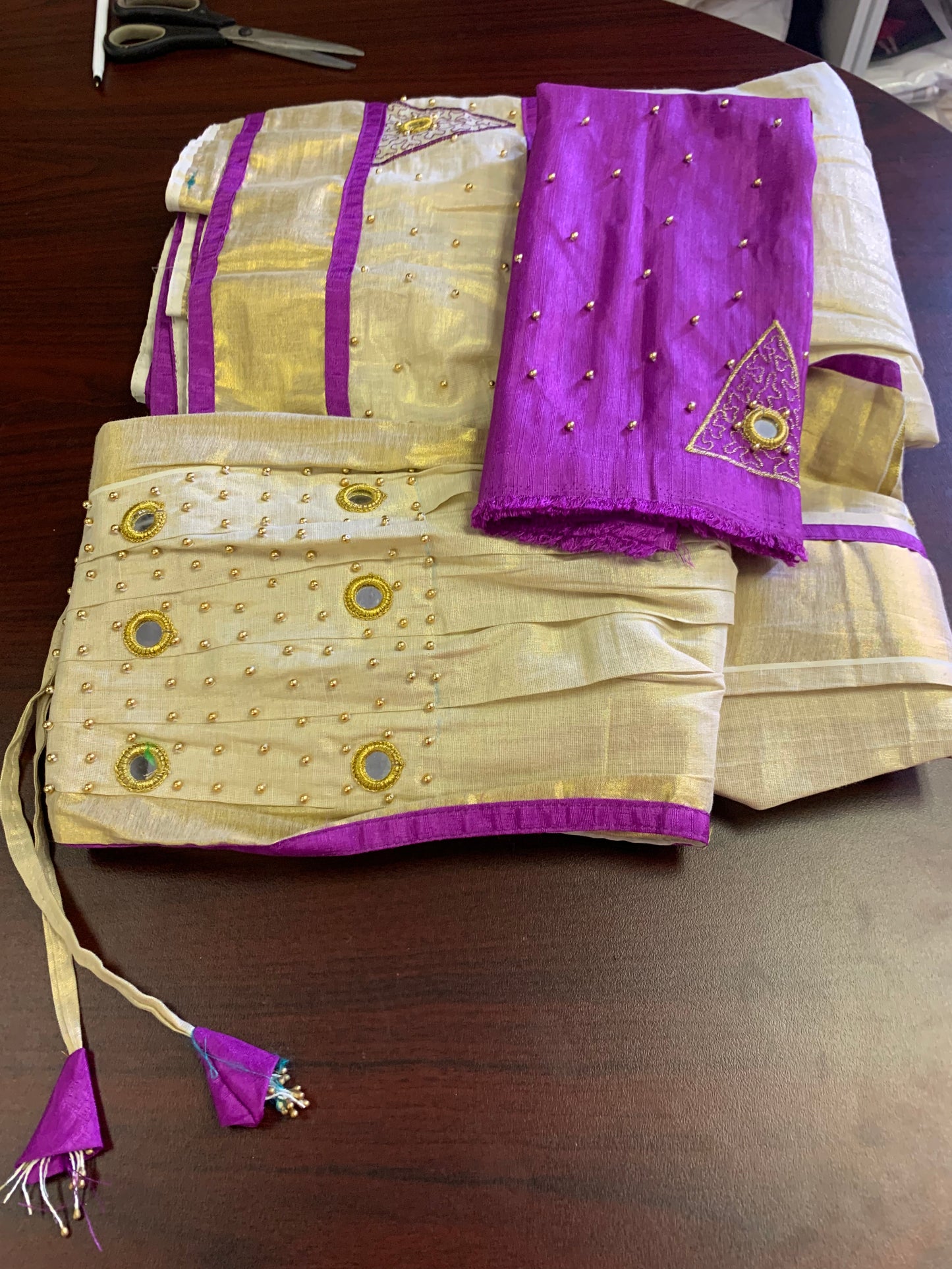 Kerala golden tissue and purple davani set