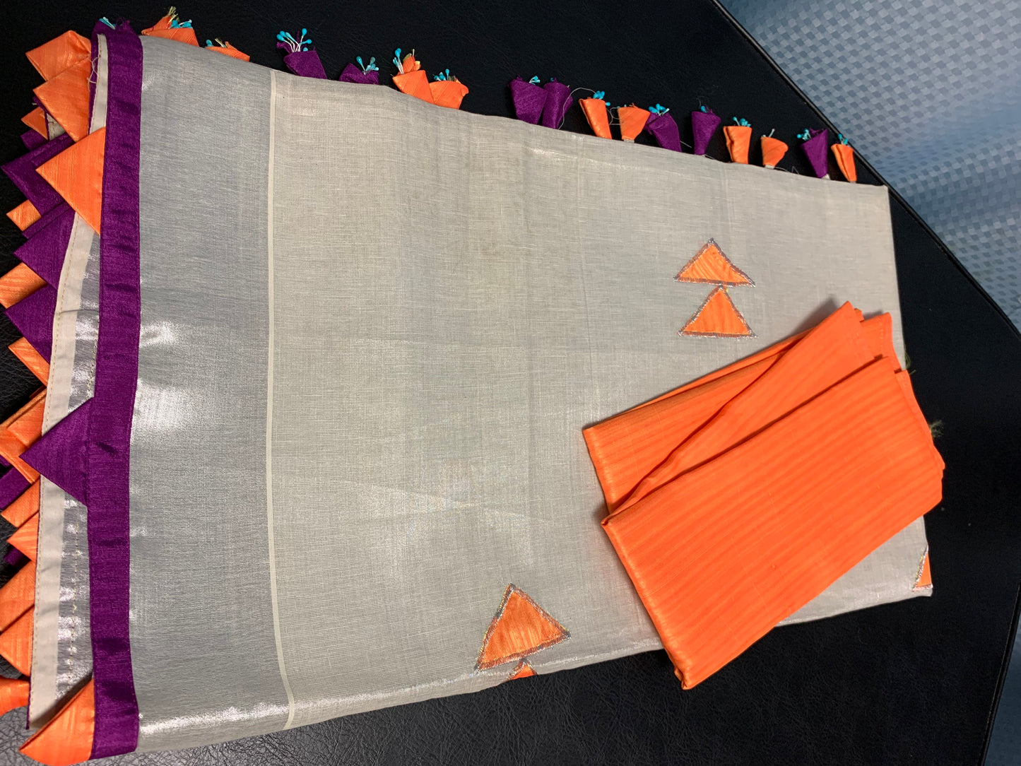 Kerala silver tissue saree with orange and purple patch work