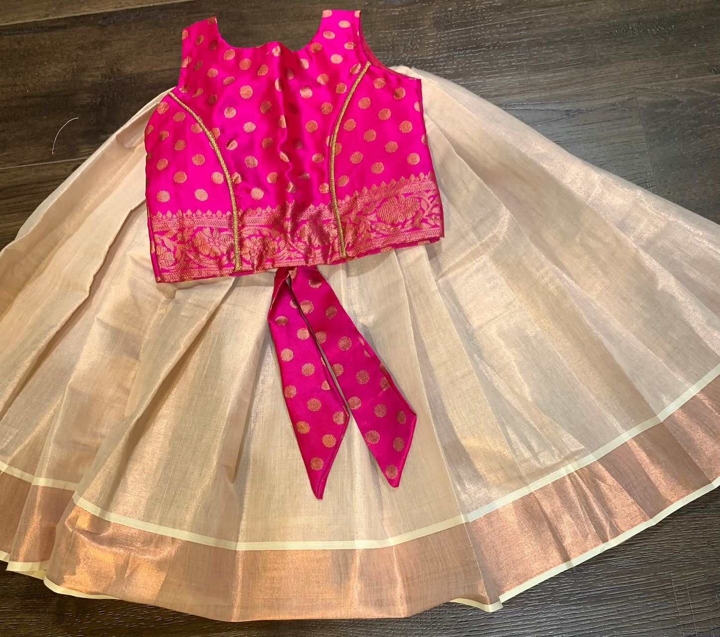 Rose gold Kerala kasavu border skirt with magenta silk brocade blouse