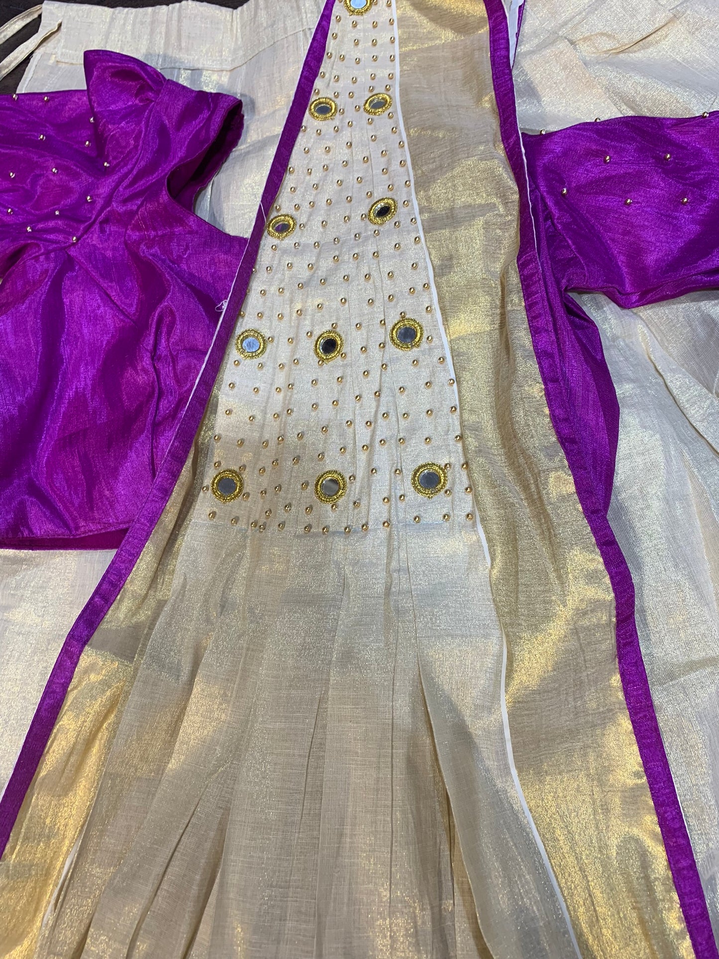 Kerala golden tissue and purple davani set