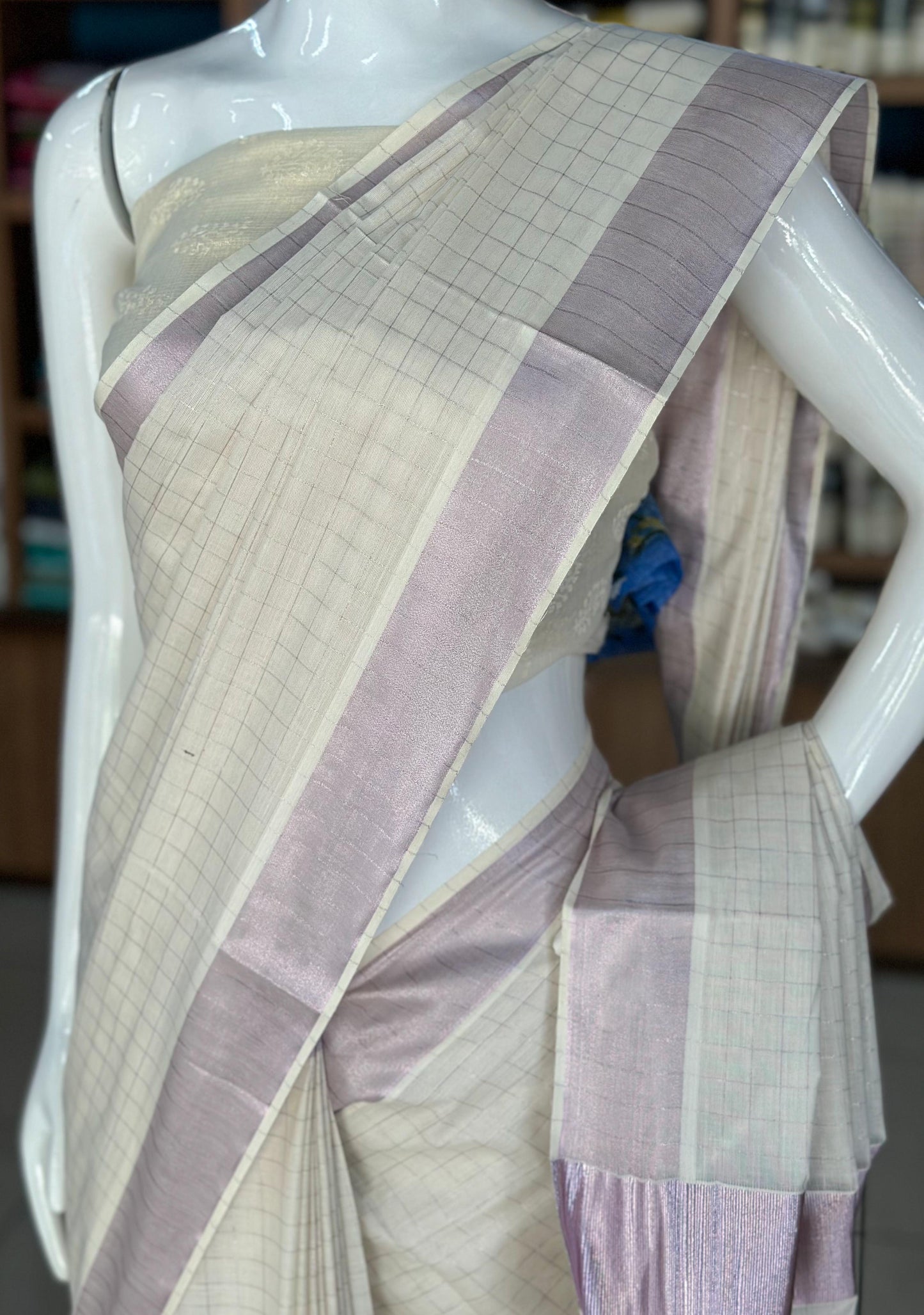 pink tissue kerala saree with checked pattern