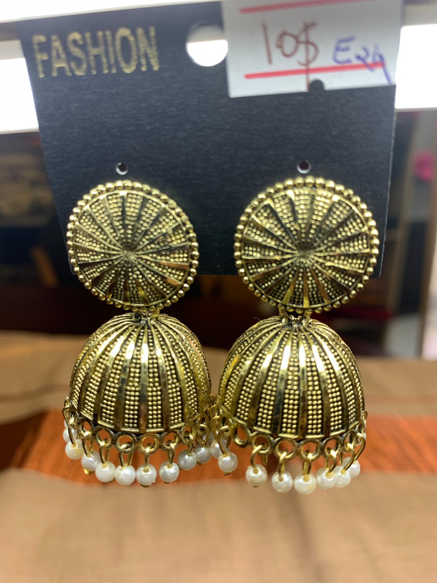 Golden jhumka earring with cream pearls