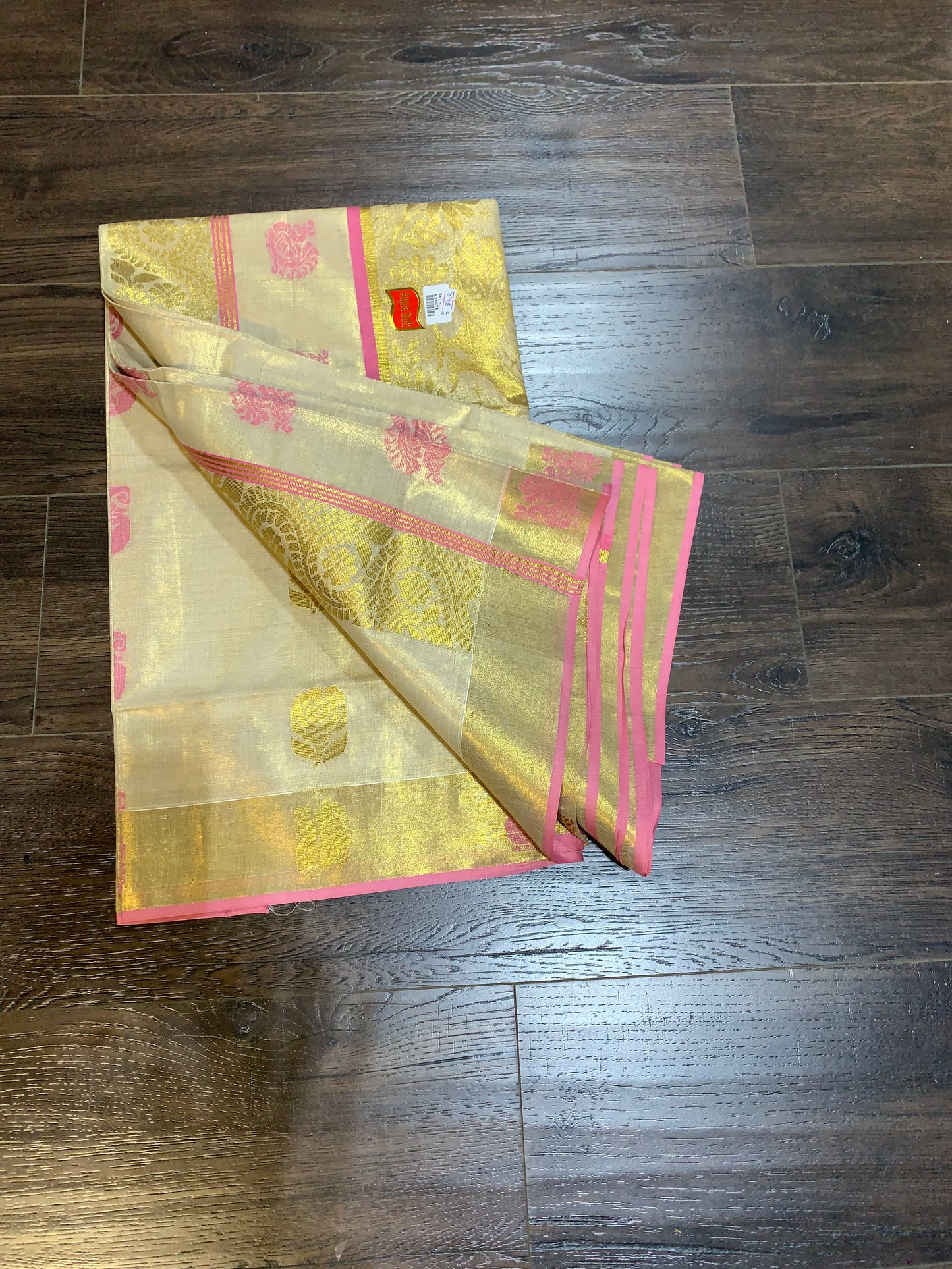 Kerala golden tissue saree with pink border