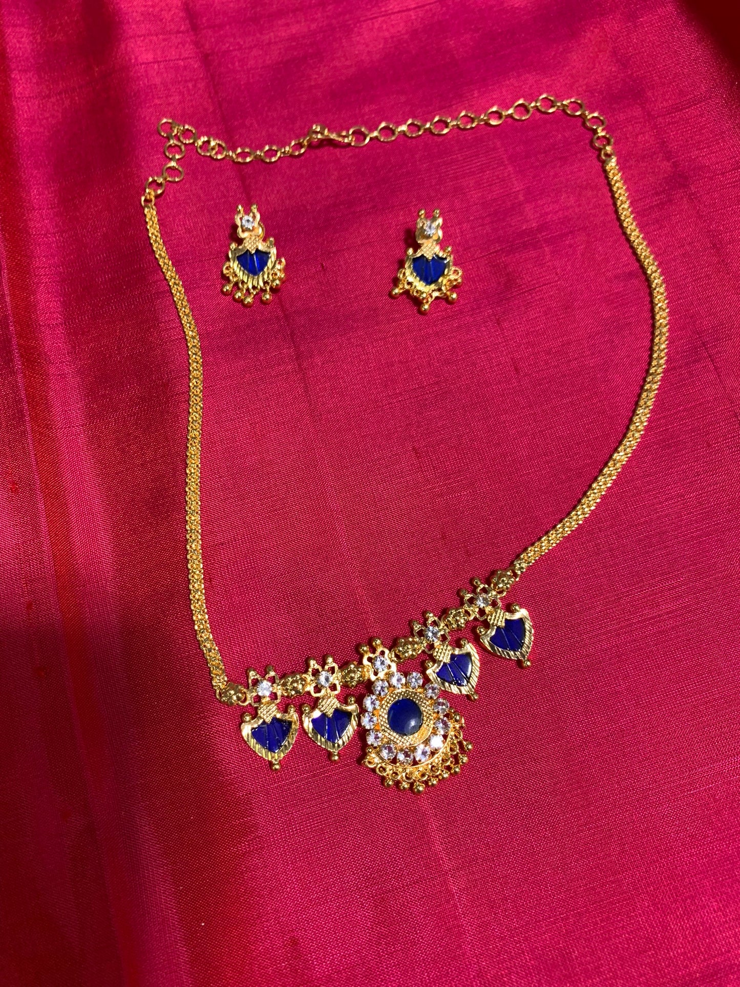 Golden chain with beautiful blue stone