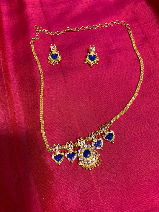 Golden chain with beautiful blue stone