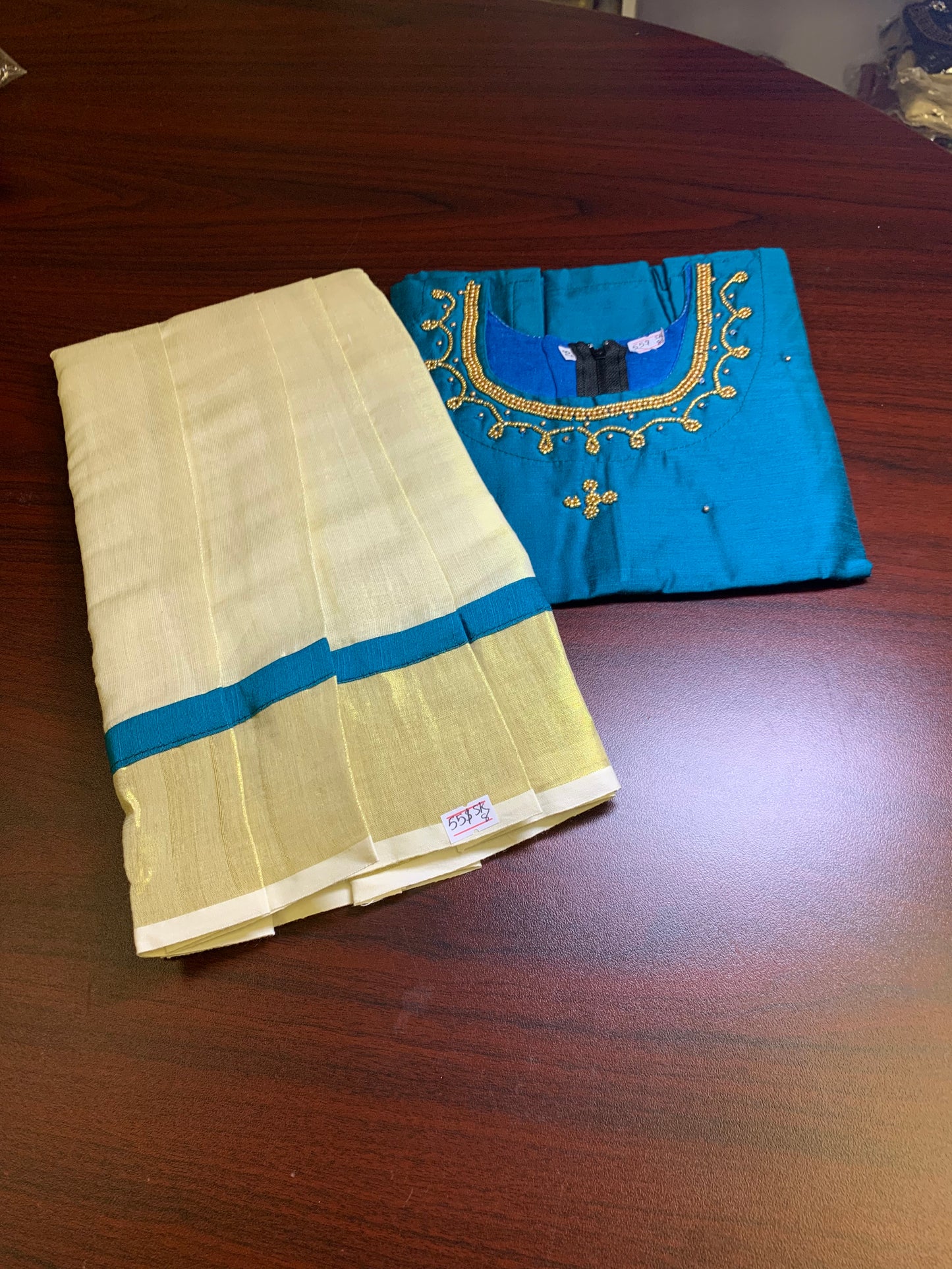 Kerala kasavu border skirt with blue silk blouse