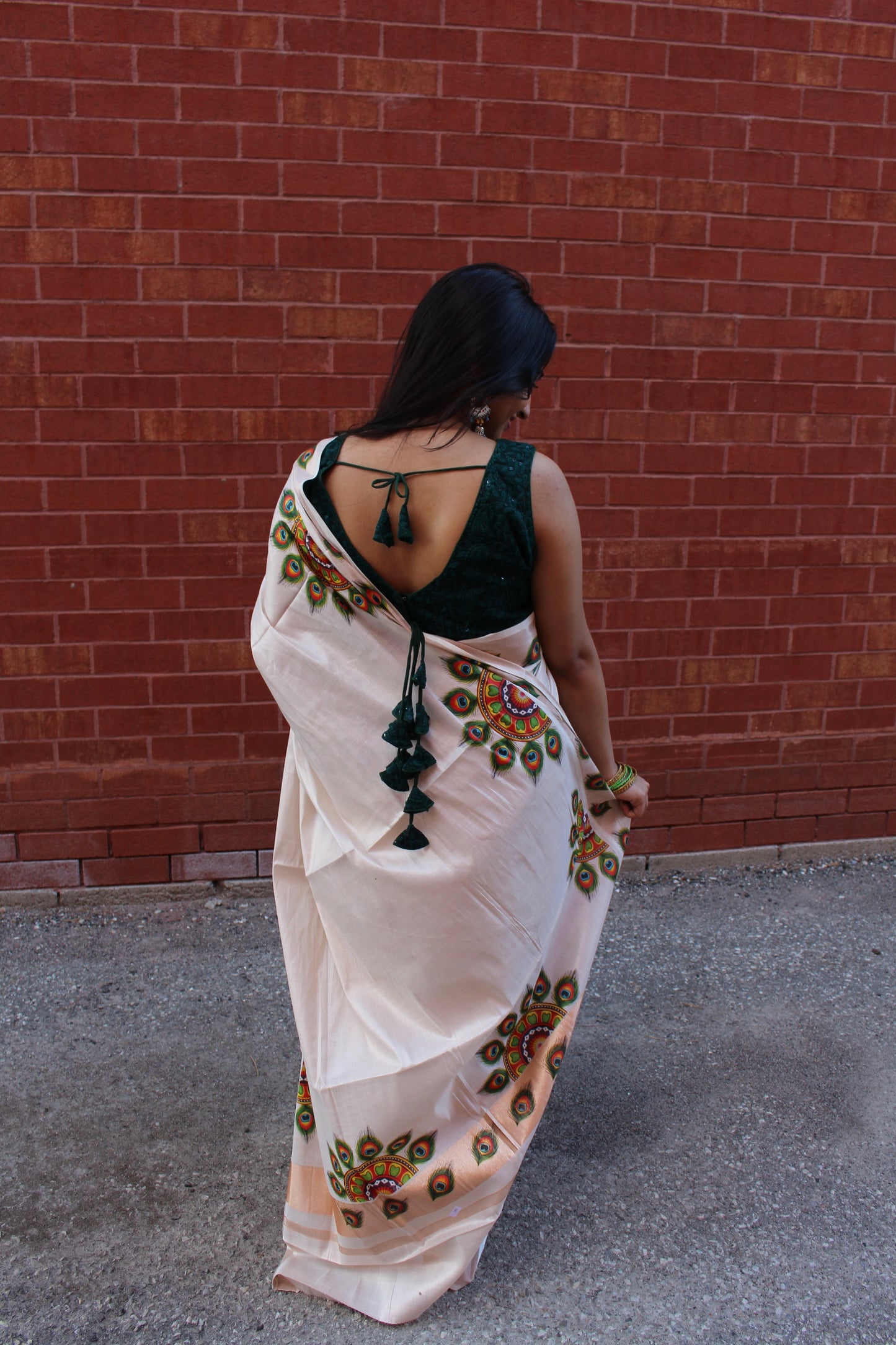 Kerala rose gold tissue saree with peacock feather design