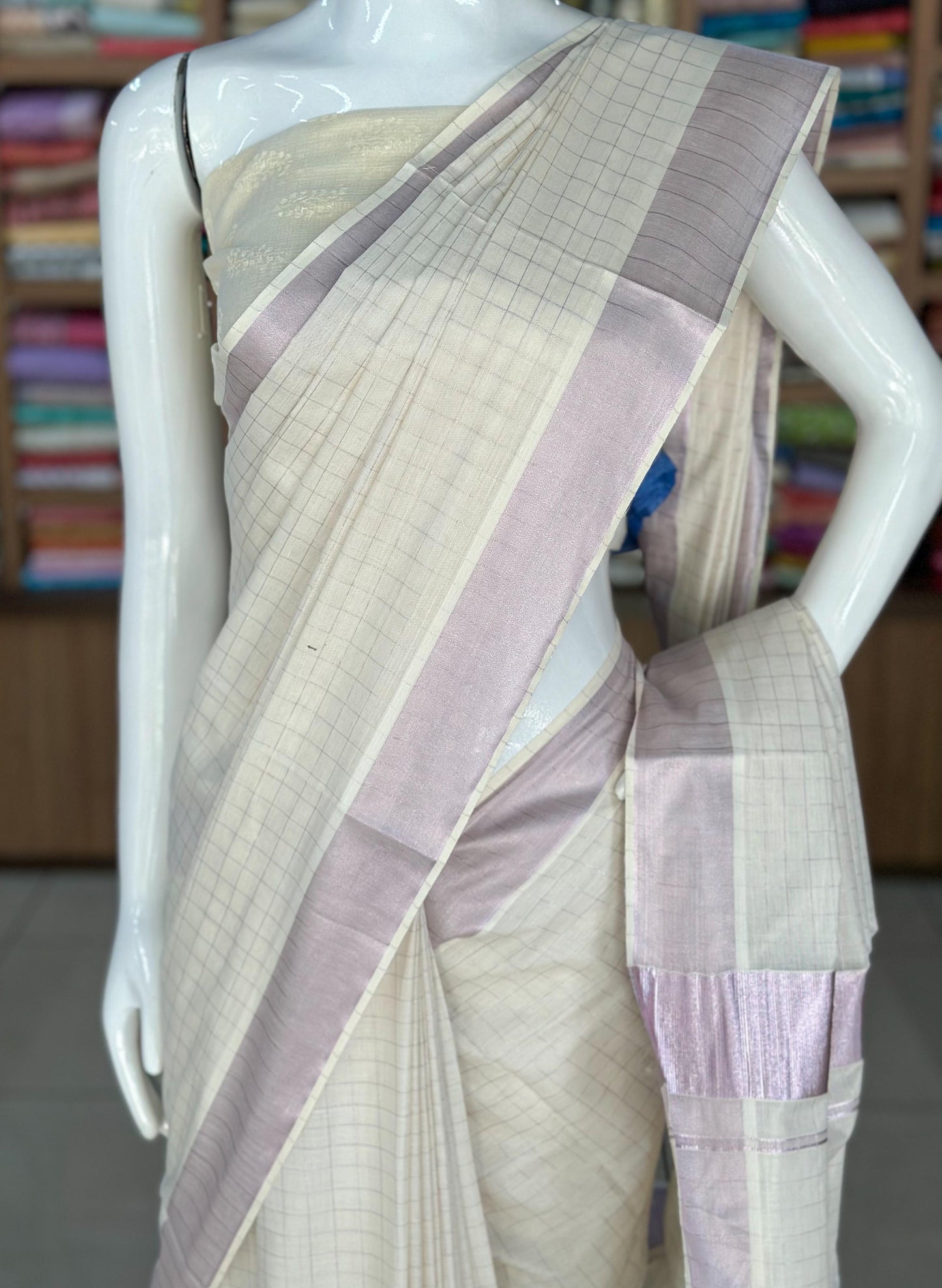 pink tissue kerala saree with checked pattern