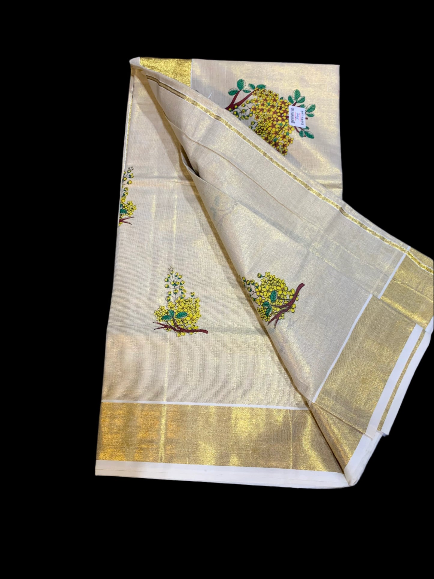 Kerala golden tissue settu saree with floral print