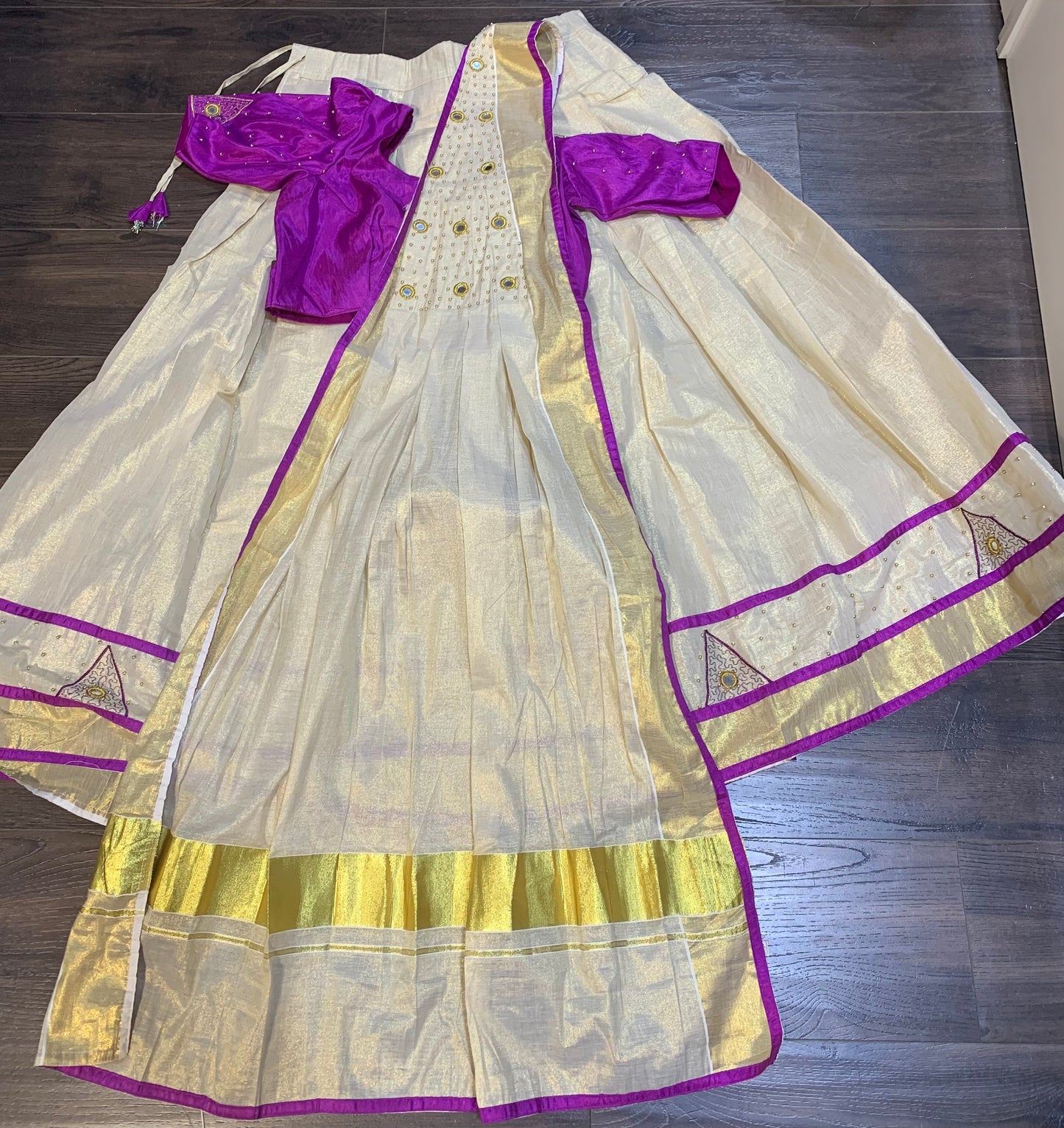 Kerala golden tissue and purple davani set