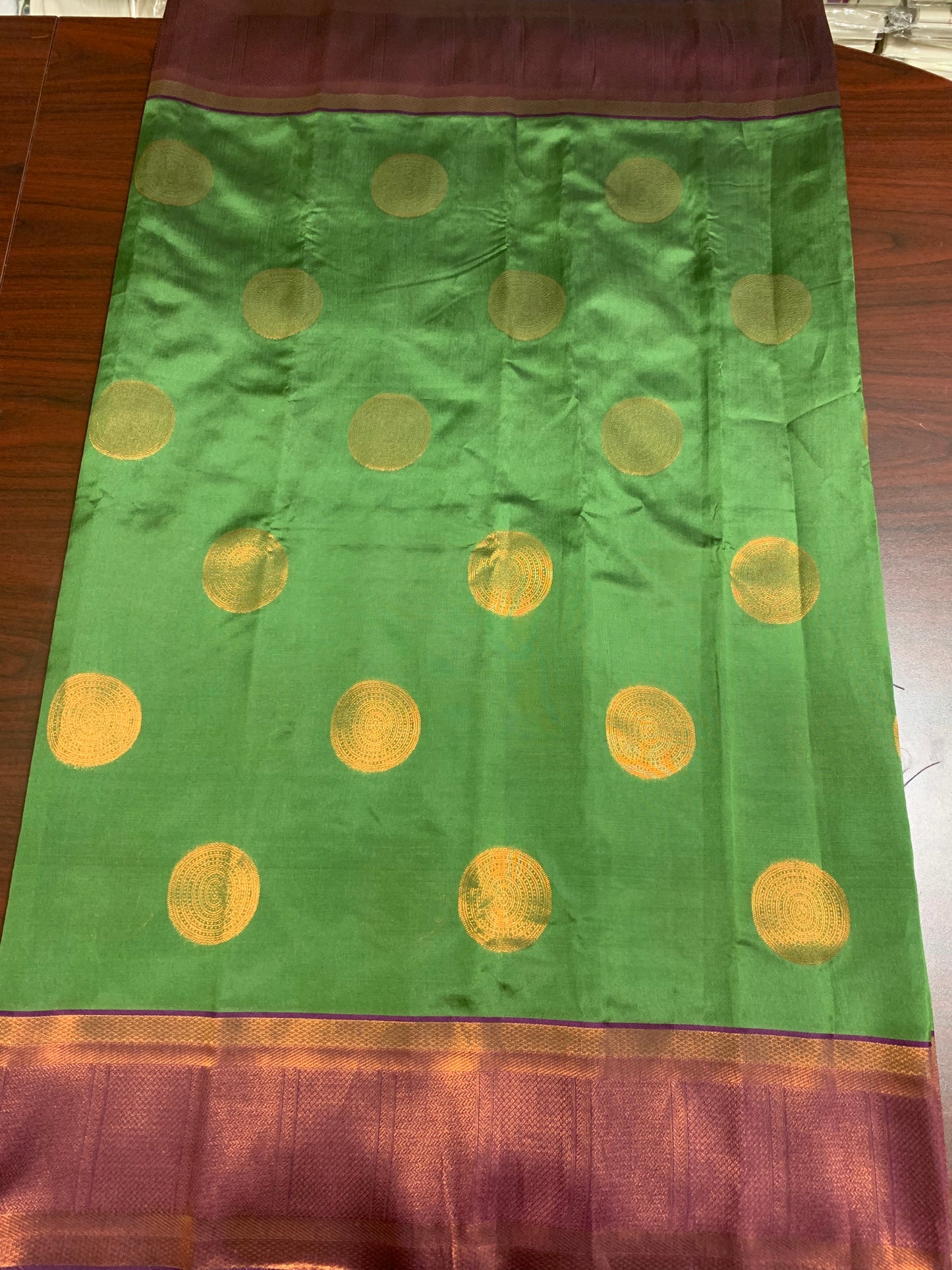 Green-copper zari border art silk saree(ready made blouse)