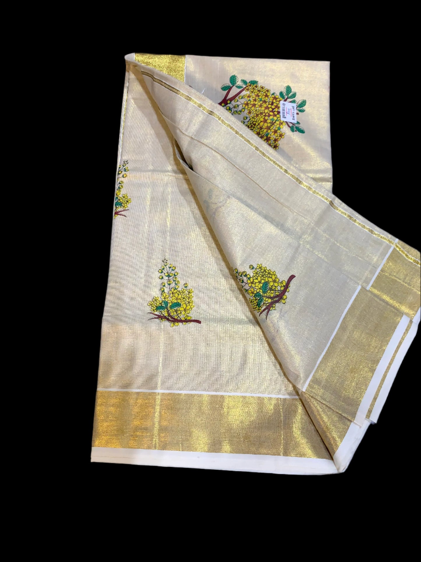 Kerala golden tissue settu saree with floral print