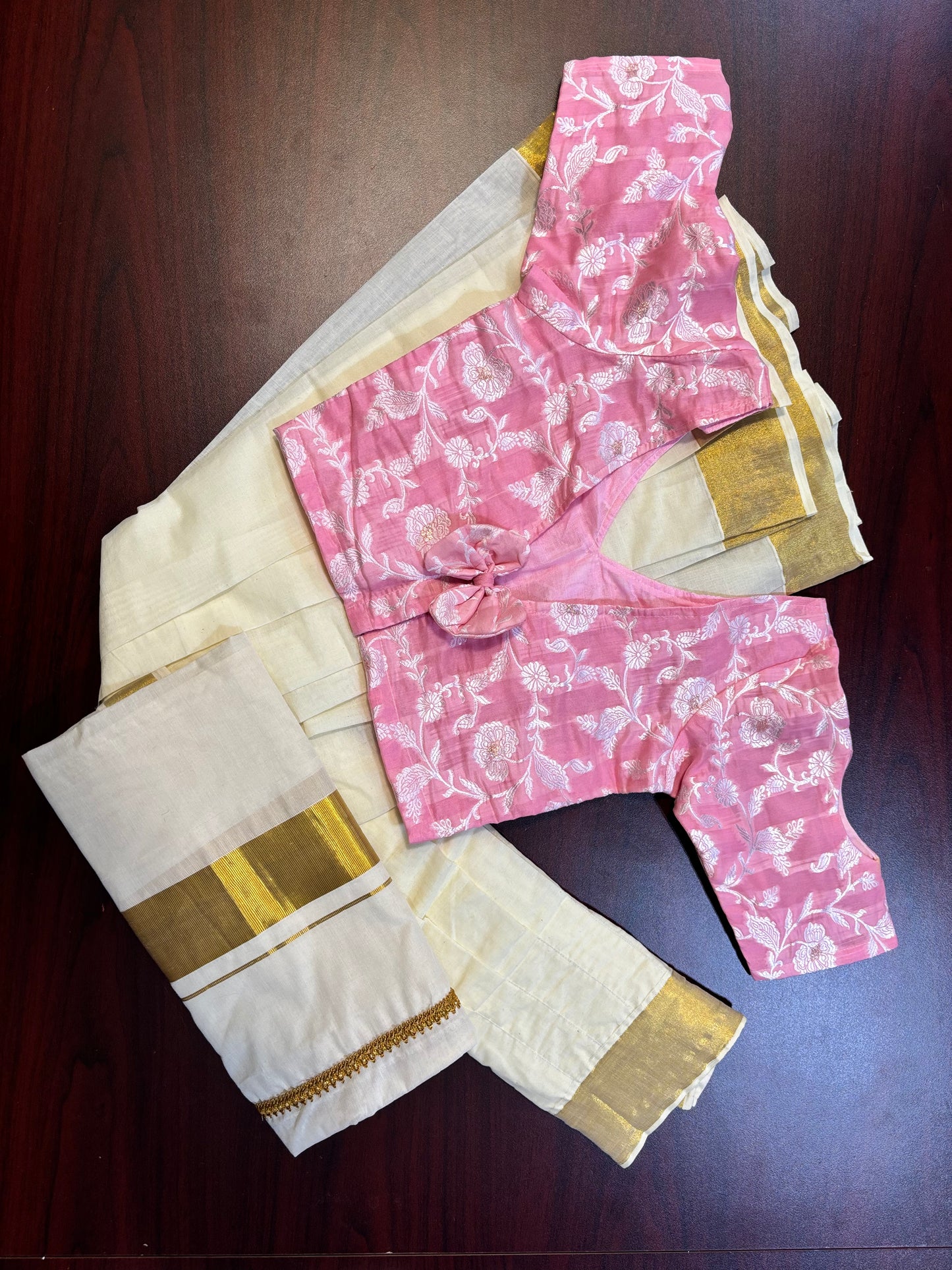 Davani set in Kerala kasavu material with pink cotton top